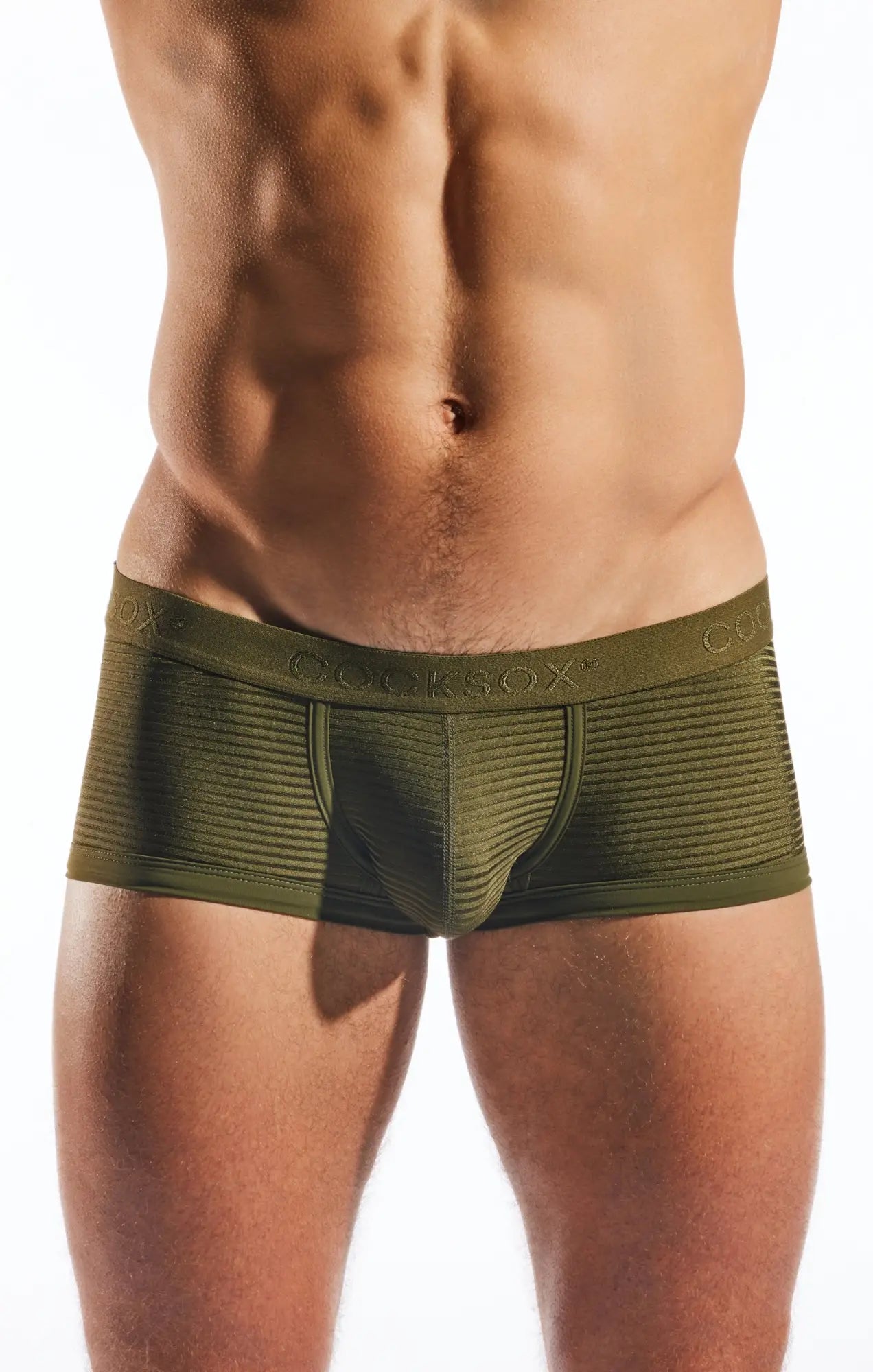 Olive green textured men’s briefs with a ribbed waistband featuring the cocksox brand name cx68lux semi sheer trunk