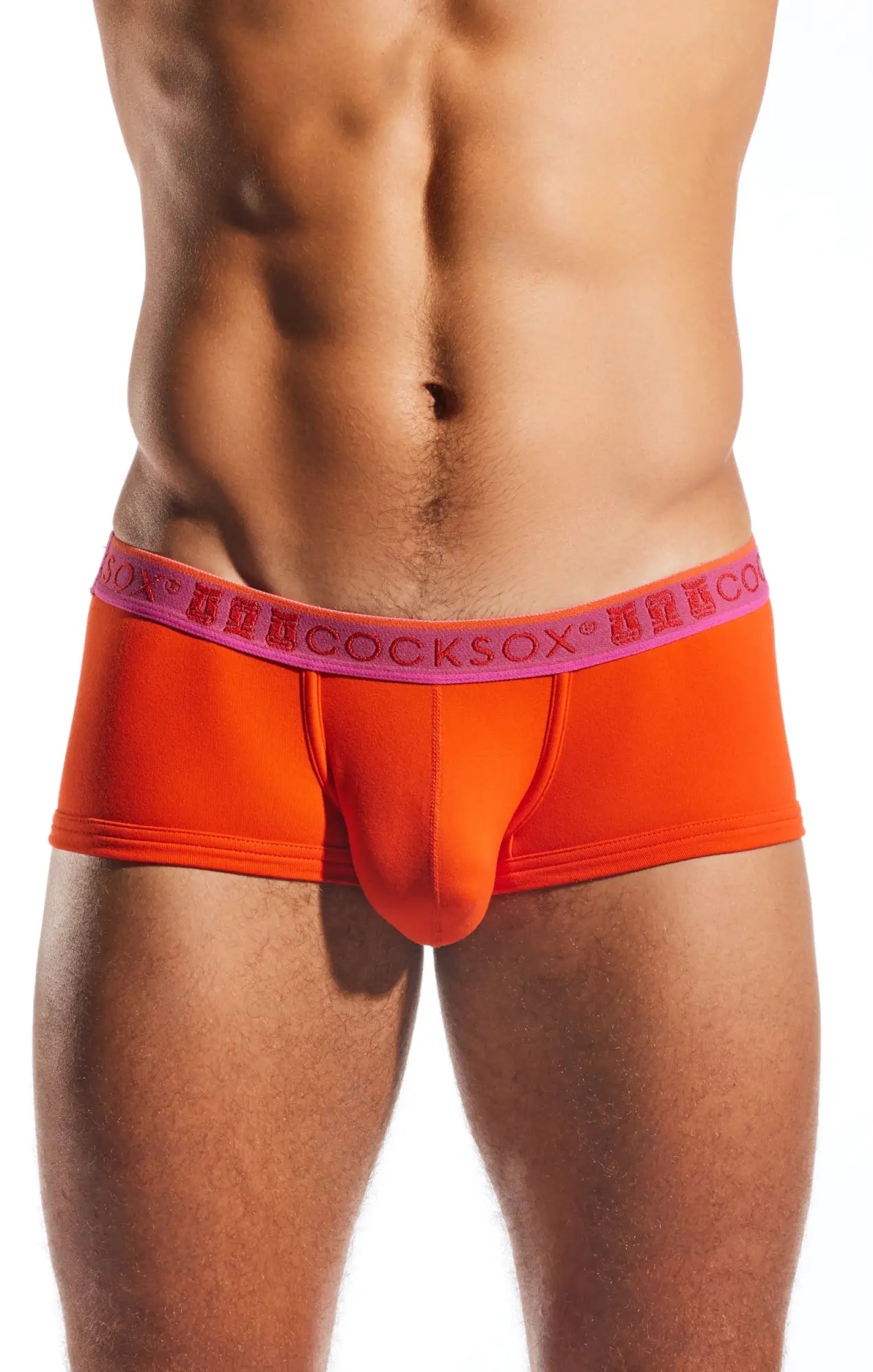 Bright orange men’s briefs cx68n trunk with pink elastic waistband featuring repeating cocksox branding