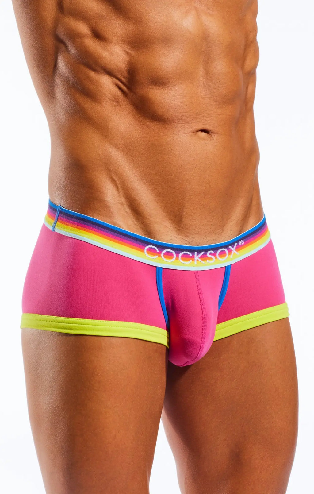 Bright pink cocksox men’s briefs cx68n trunk with rainbow-striped waistband and neon green trim
