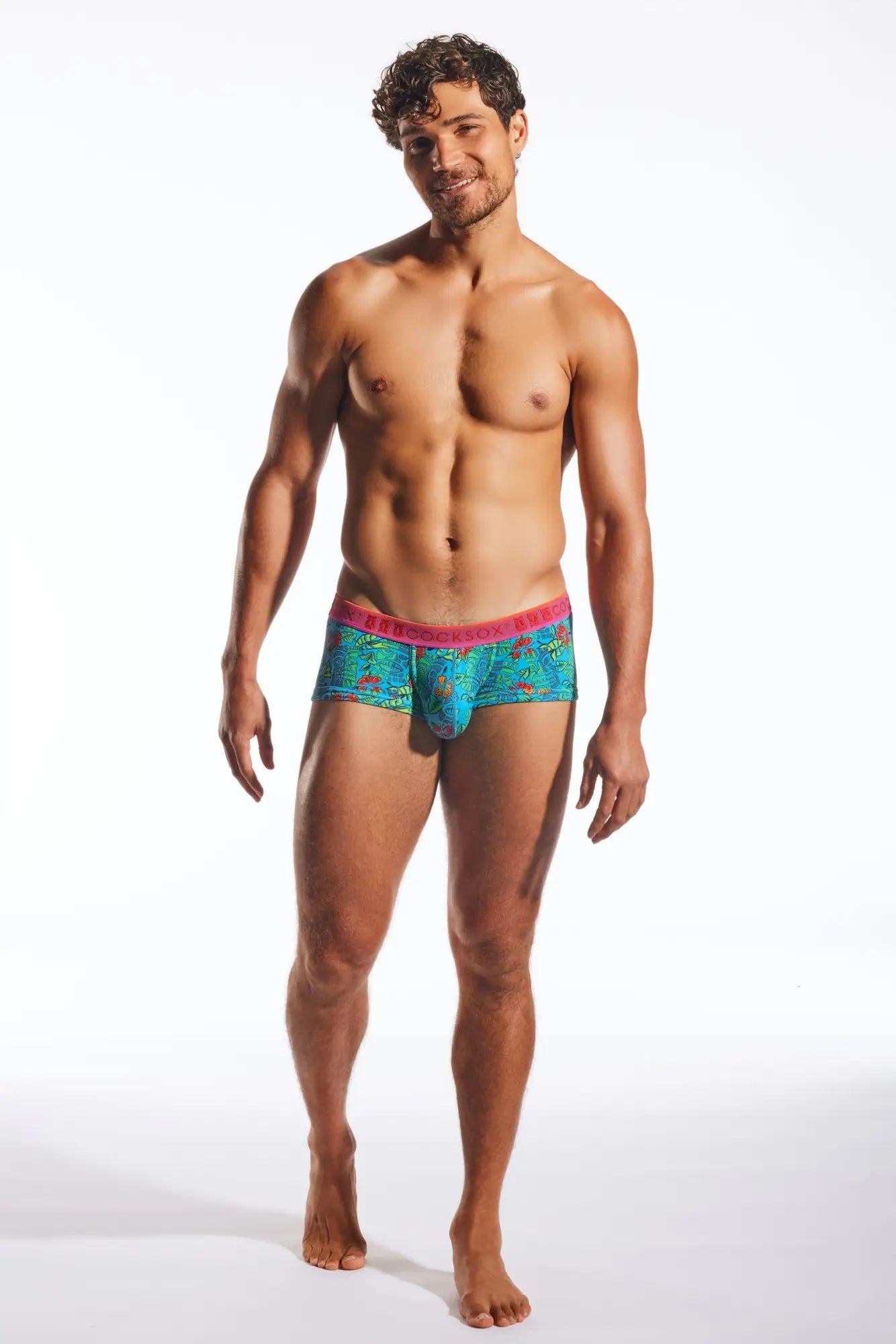 Turquoise patterned briefs with a pink waistband from the cx68n trunk collection for comfortable everyday wear