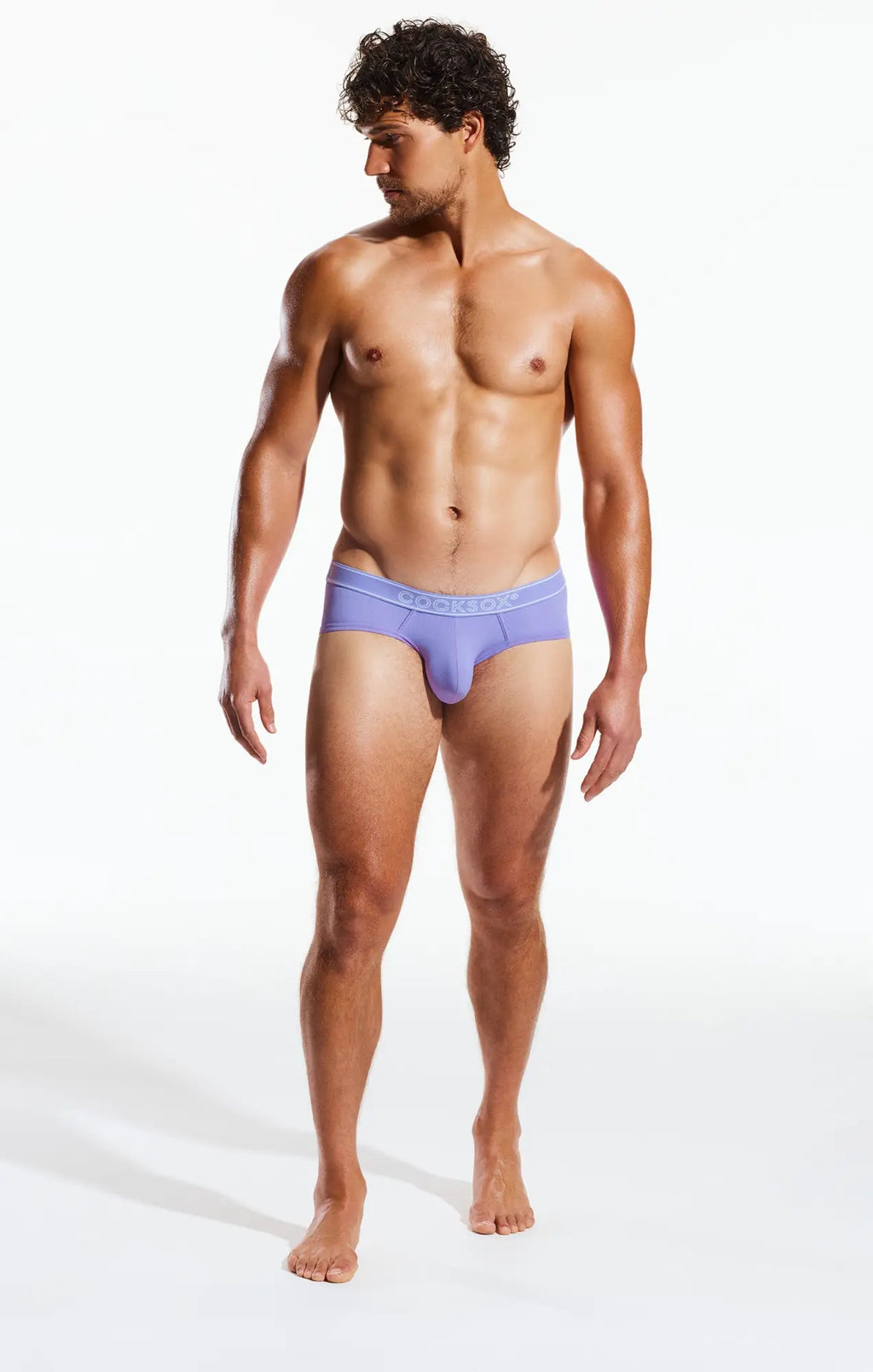 Purple cx76br sports briefs with subtle elastic waistband designed for comfort and active wear