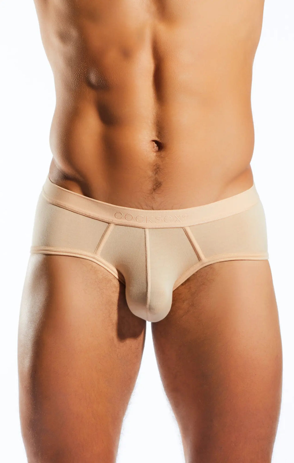 Beige cx76md sports brief with smooth seamless design and subtle stitching details for comfortable wear