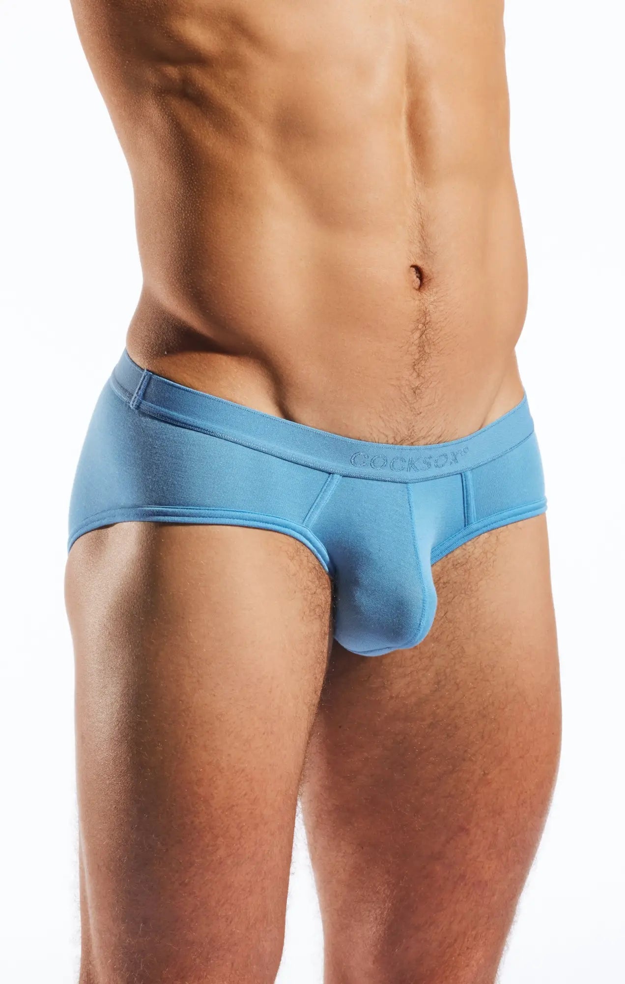 Light blue form-fitting cx76md sports briefs with smooth fabric and cragasox embroidered waistband for men