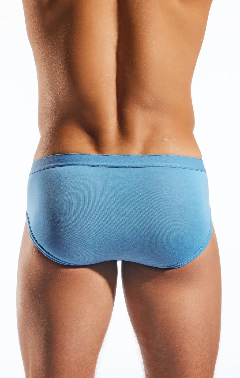 Light blue cx76md sports briefs with smooth stretchy fabric and minimalist design for a comfortable fit