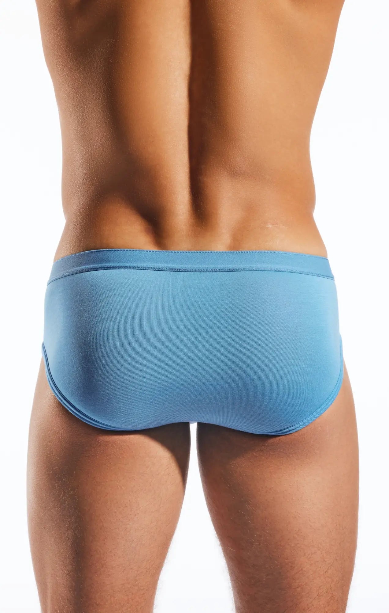 Light blue cx76md sports briefs with smooth stretchy fabric and minimalist design for a comfortable fit