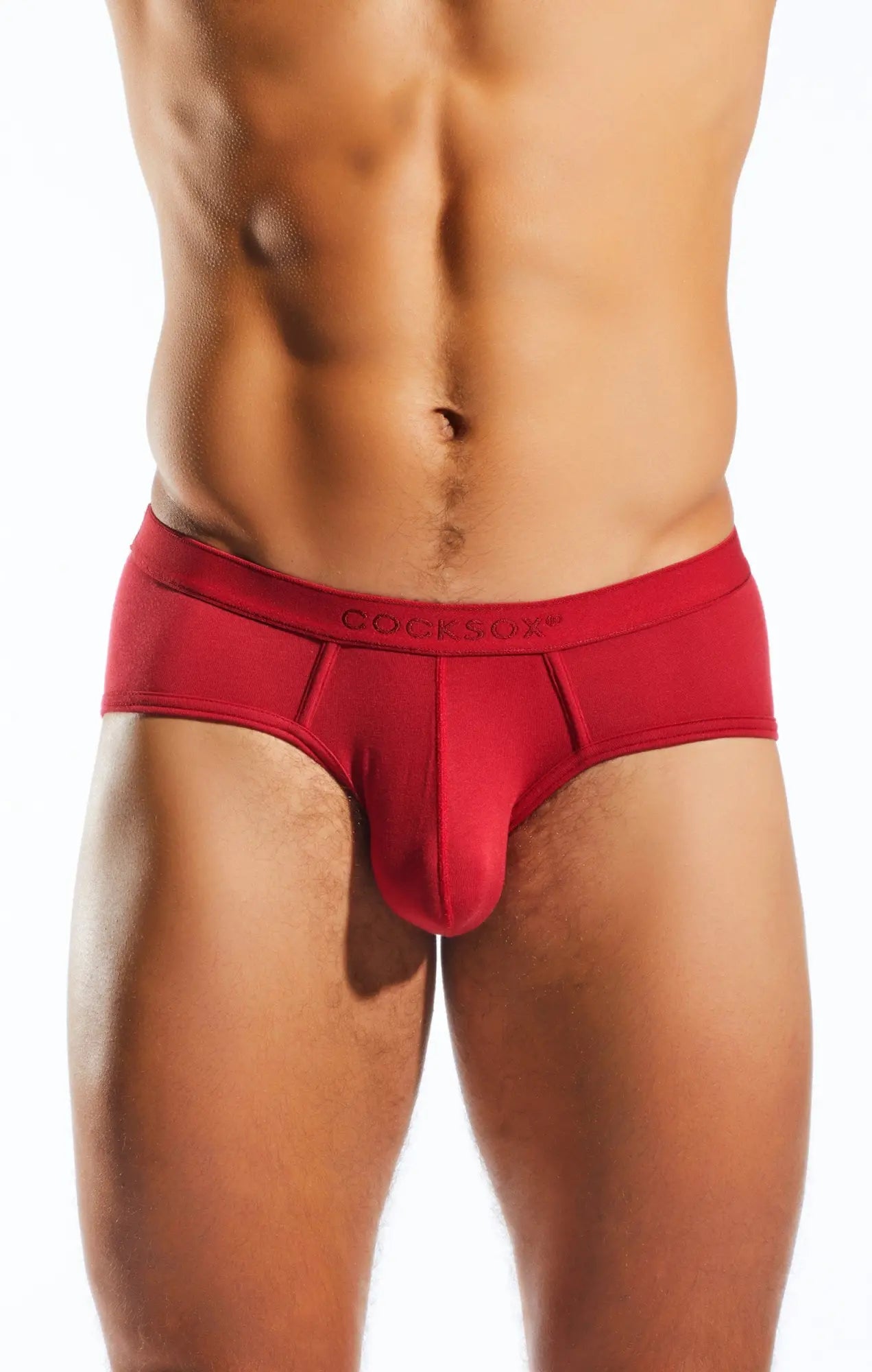 Red cockson cx76md sports briefs in red with smooth form-fitting fabric and central seam design