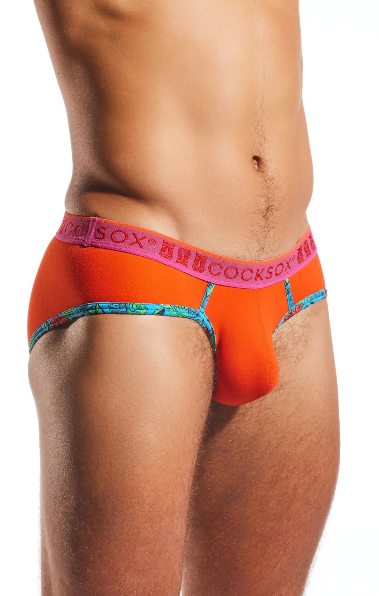 Cx76n sports brief bright orange cocksox briefs with pink waistband and turquoise patterned trim in soft fabric