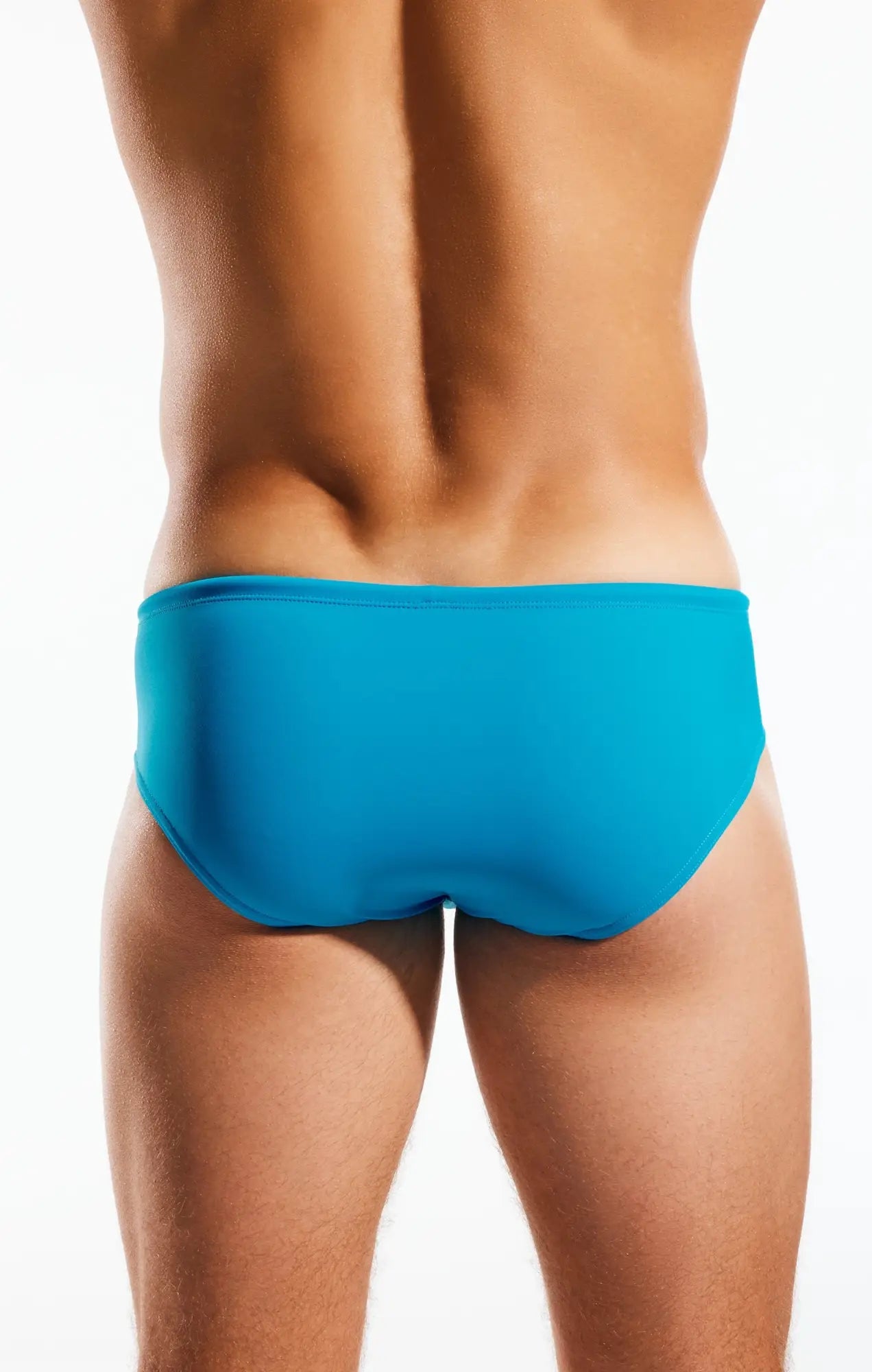 Bright blue cx79 boy leg swim brief with smooth form-fitting design for comfortable swimming and beachwear