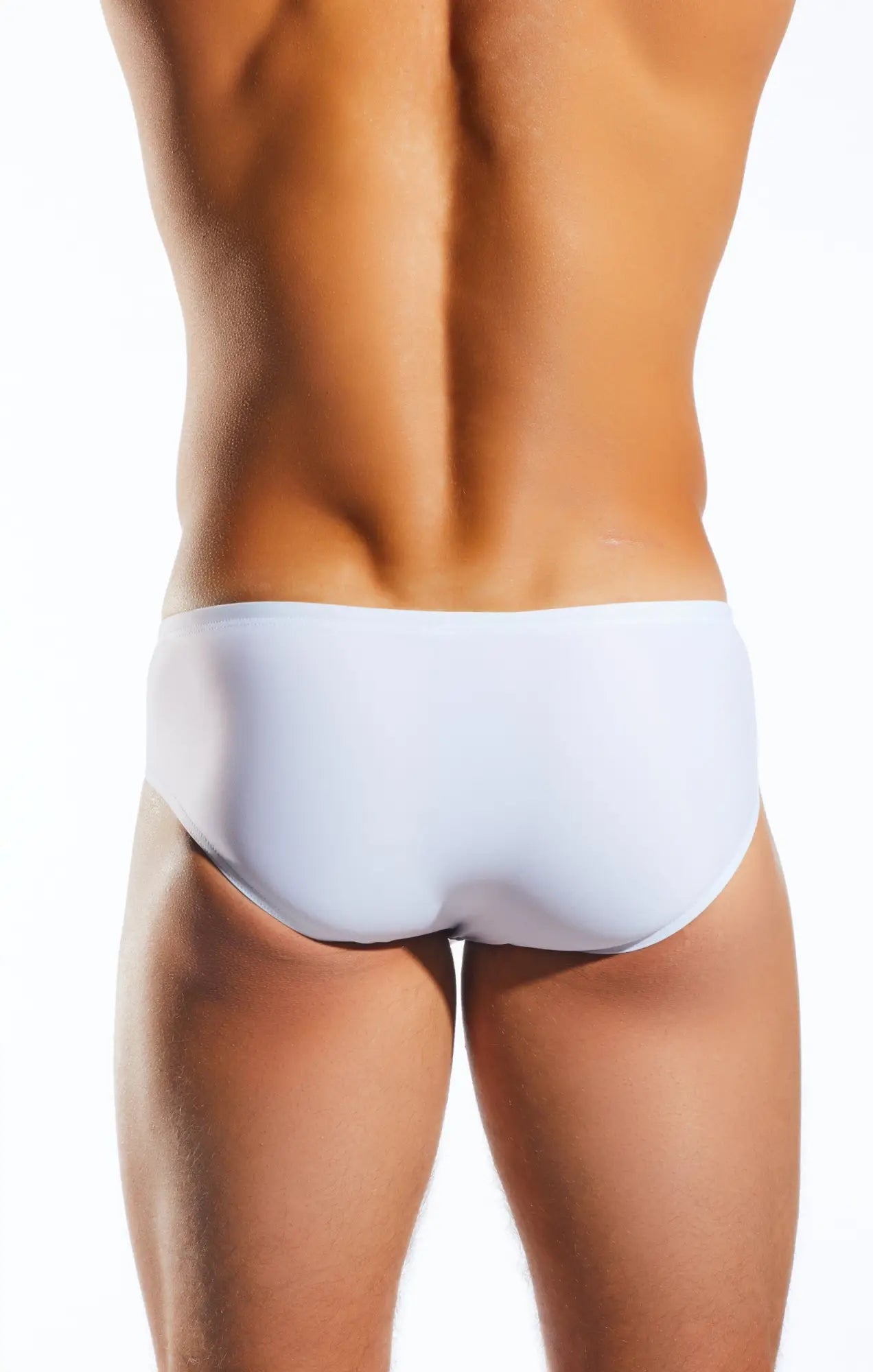 White cx79 boy leg swim brief with smooth form-fitting design ideal for comfortable swimwear use