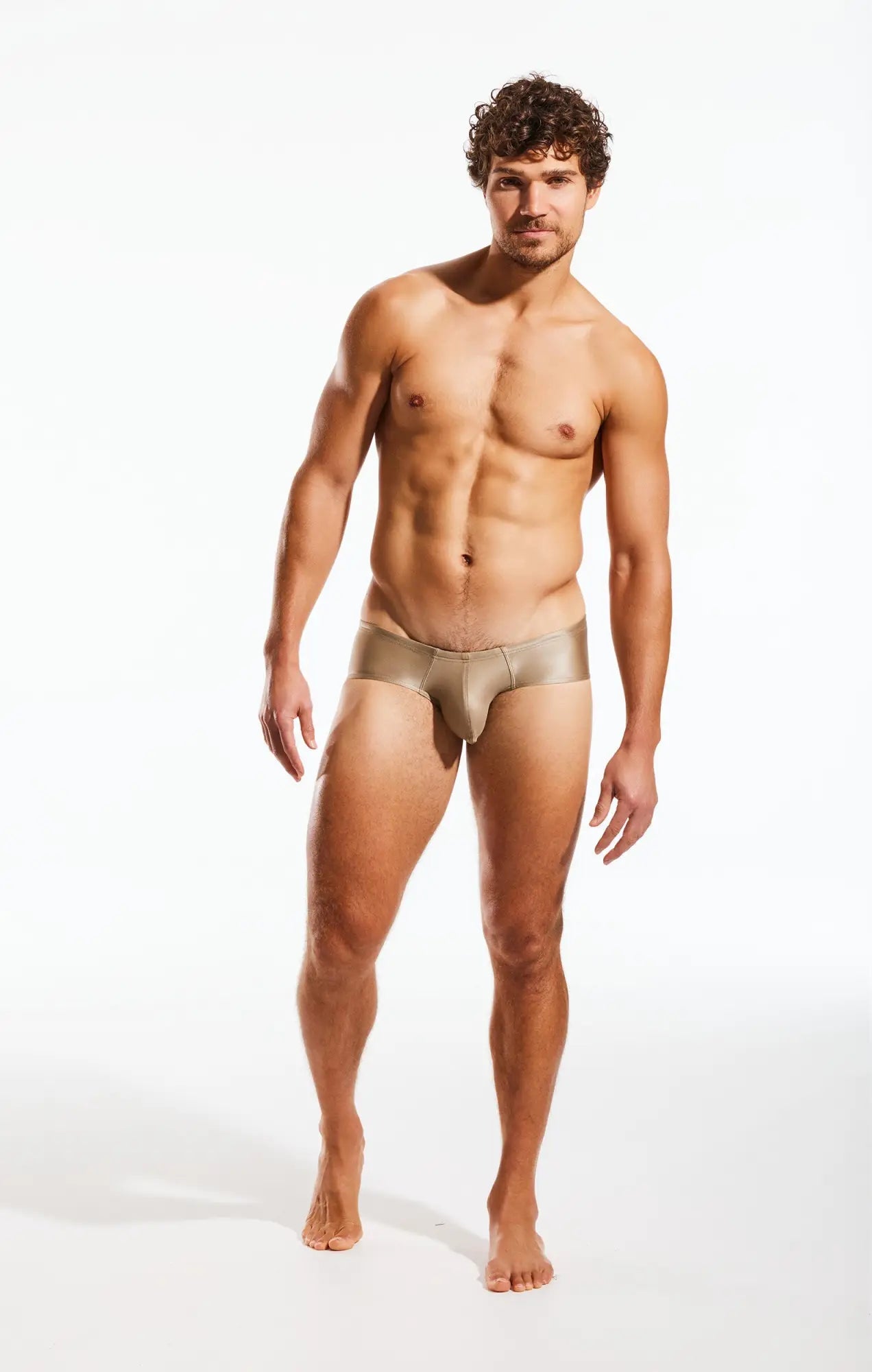 A sleek metallic gold cx79gs boy leg swim brief with smooth form fitting design for comfortable swimwear use
