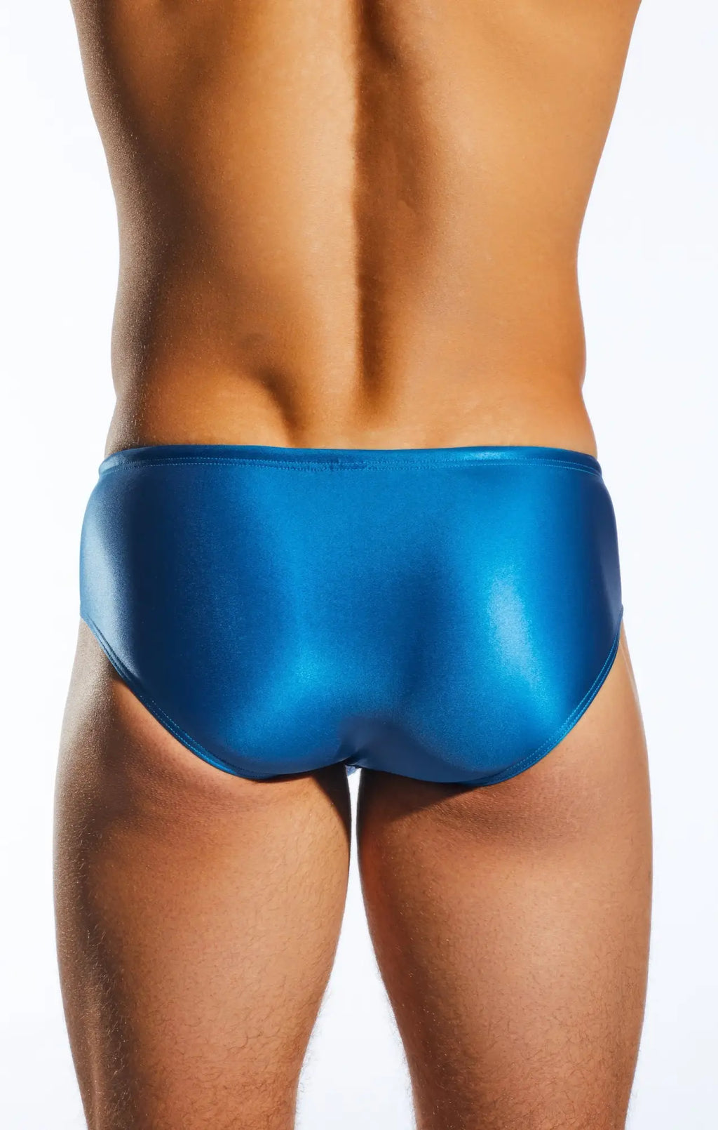 Cx79gs boy leg swim brief in vibrant blue glossy fabric with sleek form fitting design for swimming use