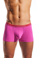 Bright pink cx94 boxer briefs with an orange waistband featuring hercosox red branding for men