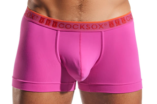Bright pink men’s cx94 boxer briefs with orange waistband and red cocksox brand name for comfortable wear