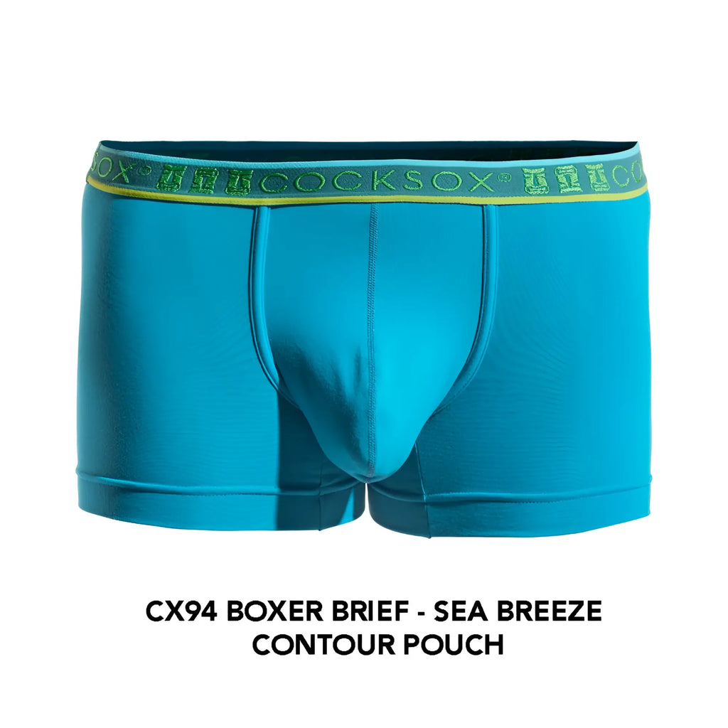 Bright turquoise cx94 boxer brief with lime green waistband featuring cocksox branding in repeating lettering