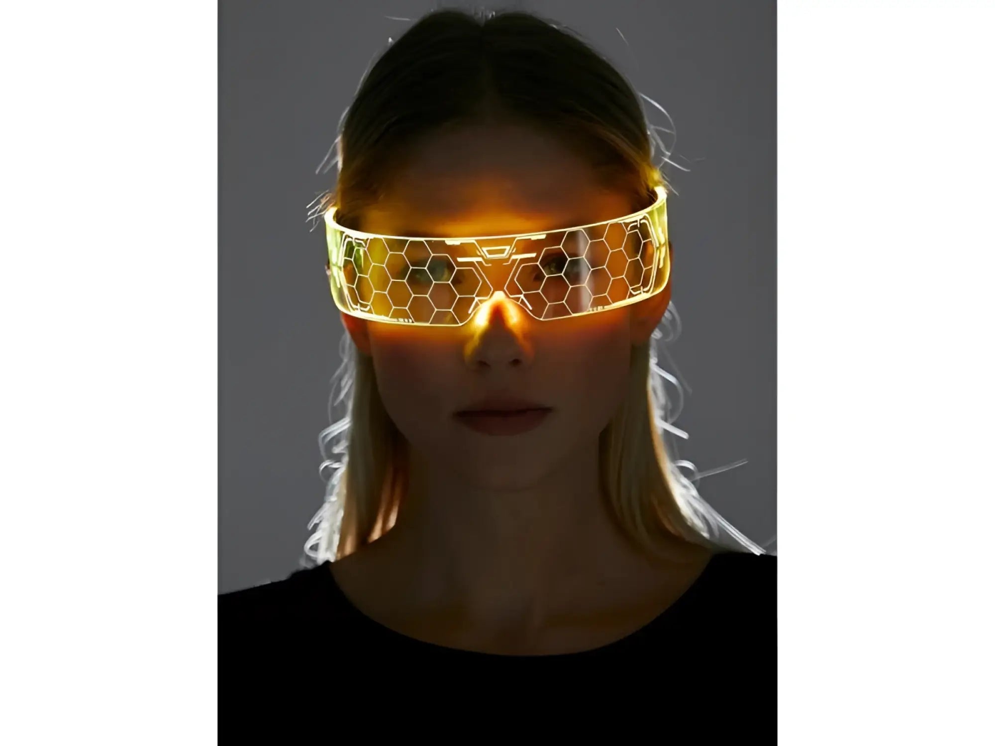 Cyberpunk light up glasses featuring a glowing orange led honeycomb visor with illuminated hexagonal panels and metallic frame