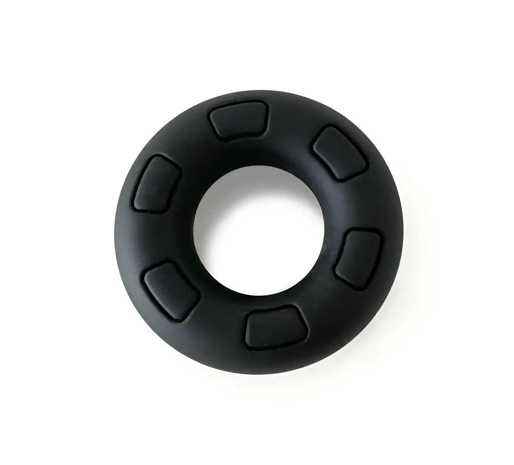 Black silicone grip ring daddy black with six raised rectangular textured sections around its circumference