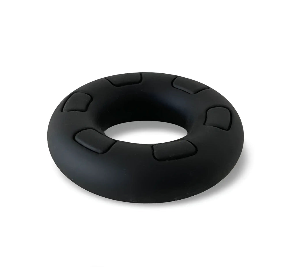 Black silicone grip ring daddy black with textured raised rectangular segments on outer edge for secure hold