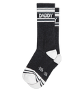 Black daddy crew socks with white stripes in textured knit material for athletic wear