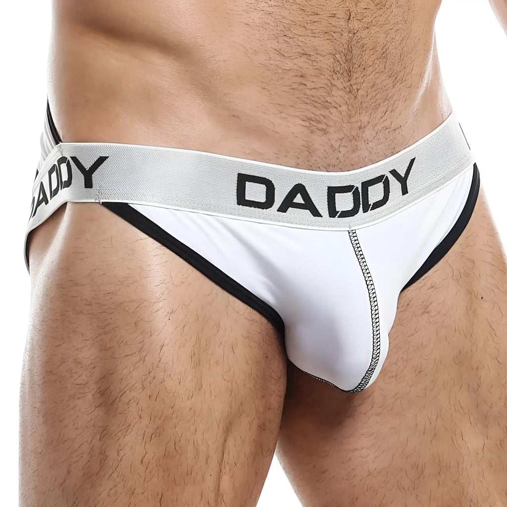 White daddy brand briefs with black trim and a silver waistband with bold black lettering for men’s underwear
