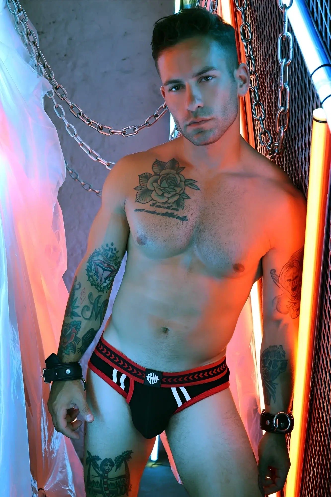 Black and red athletic briefs with white logo waistband designed for comfort and support in daddys favorite briefs
