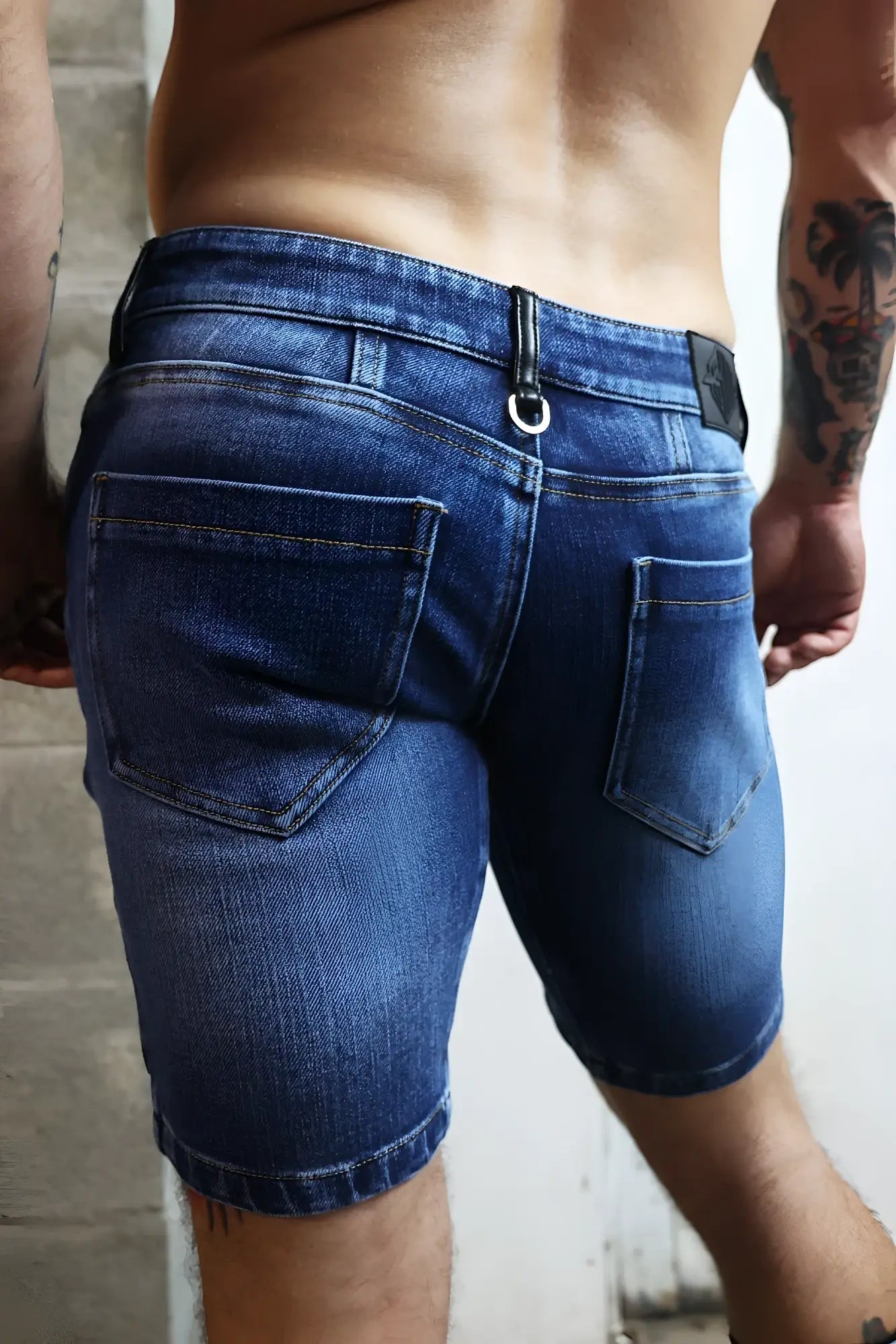 Dark blue denim shorts with classic five-pocket design and rolled cuffs called daddys favorite shorts