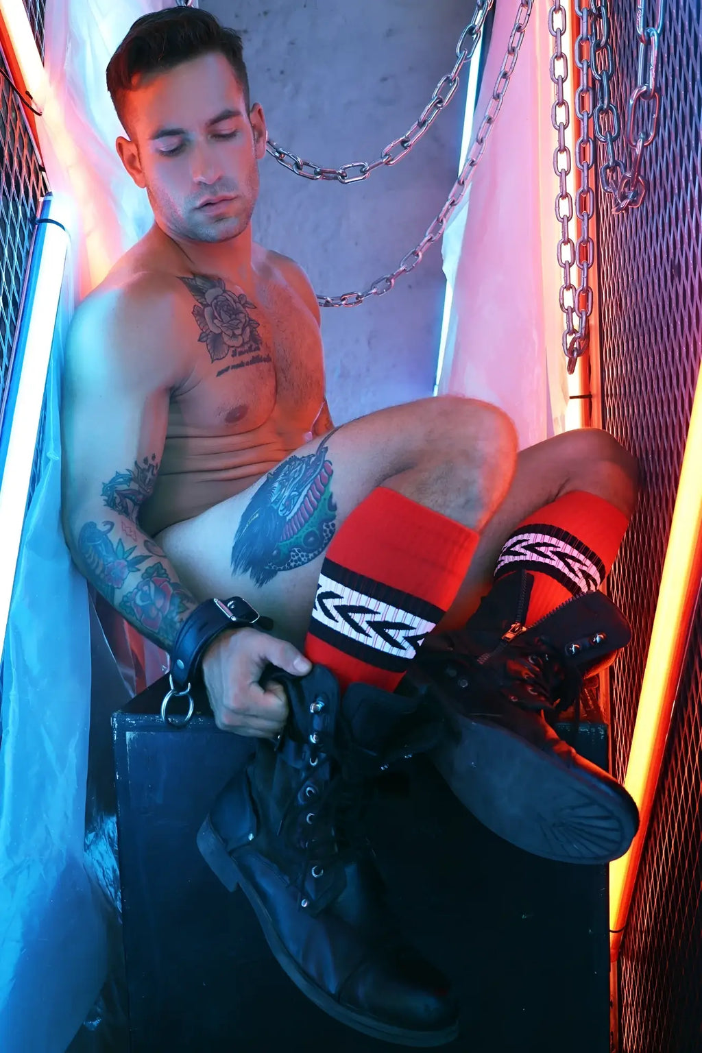 Black leather combat boot with laces and rugged sole shown in product titled daddys favorite socks