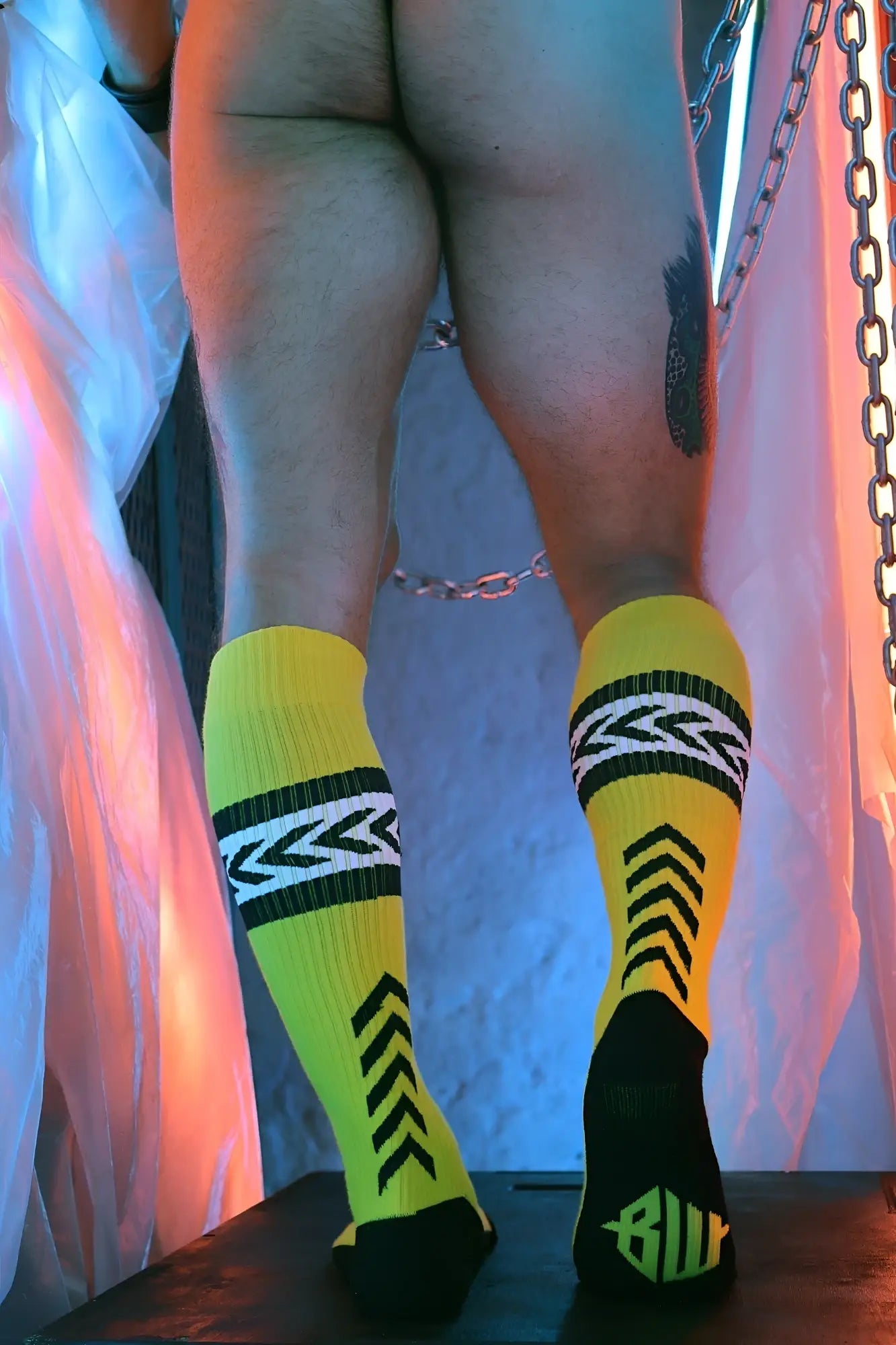 Daddys favorite socks bright yellow and black athletic socks with bold geometric arrow patterns and neon green toe accent