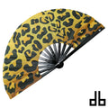 A daft boy fan folding fan with vibrant yellow and black leopard print and a sleek black handle