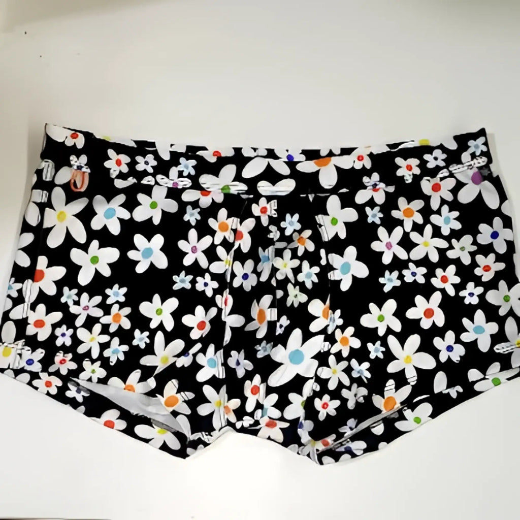 Black briefs with daisy sq cut pattern featuring white daisies with blue orange and red centers