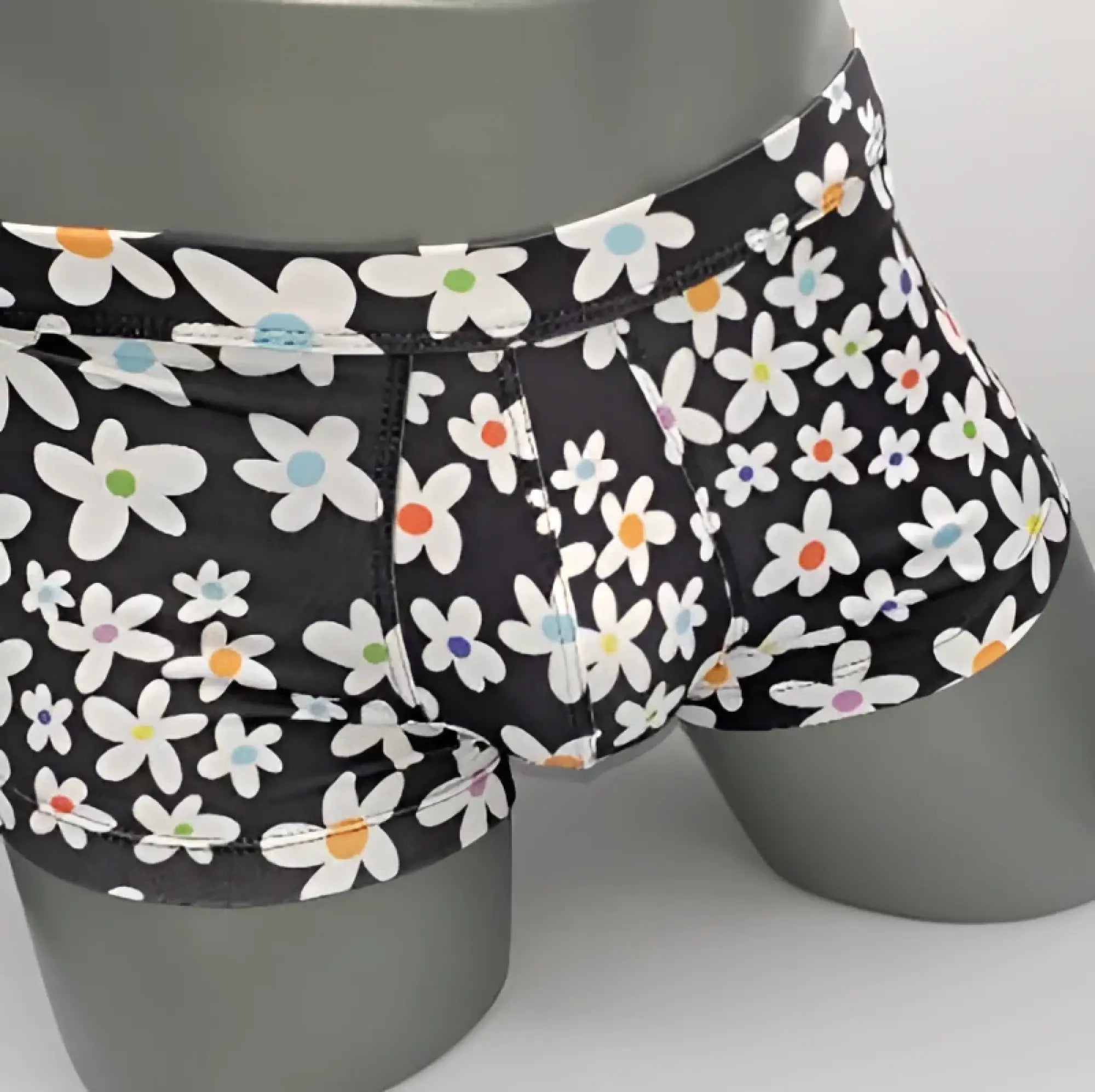 Black briefs daisy sq cut with playful white daisies and colorful orange blue purple centers in soft fabric