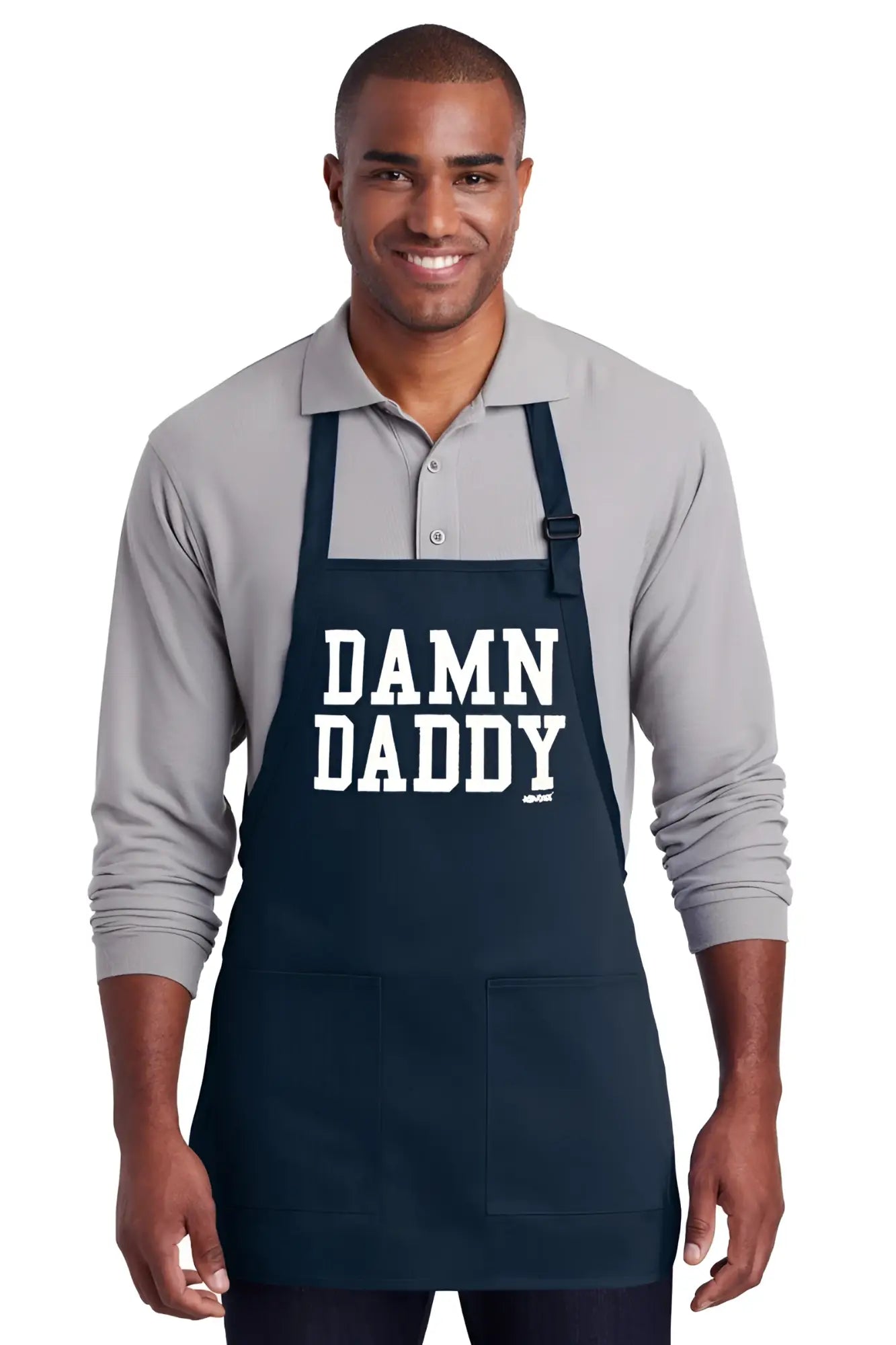 Navy blue cotton apron with white damn daddy text and two front pockets ideal for cooking or grilling