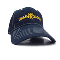 Dark blue baseball cap with yellow embroidered damn daddy text and flexing figure logo with white stitching accents