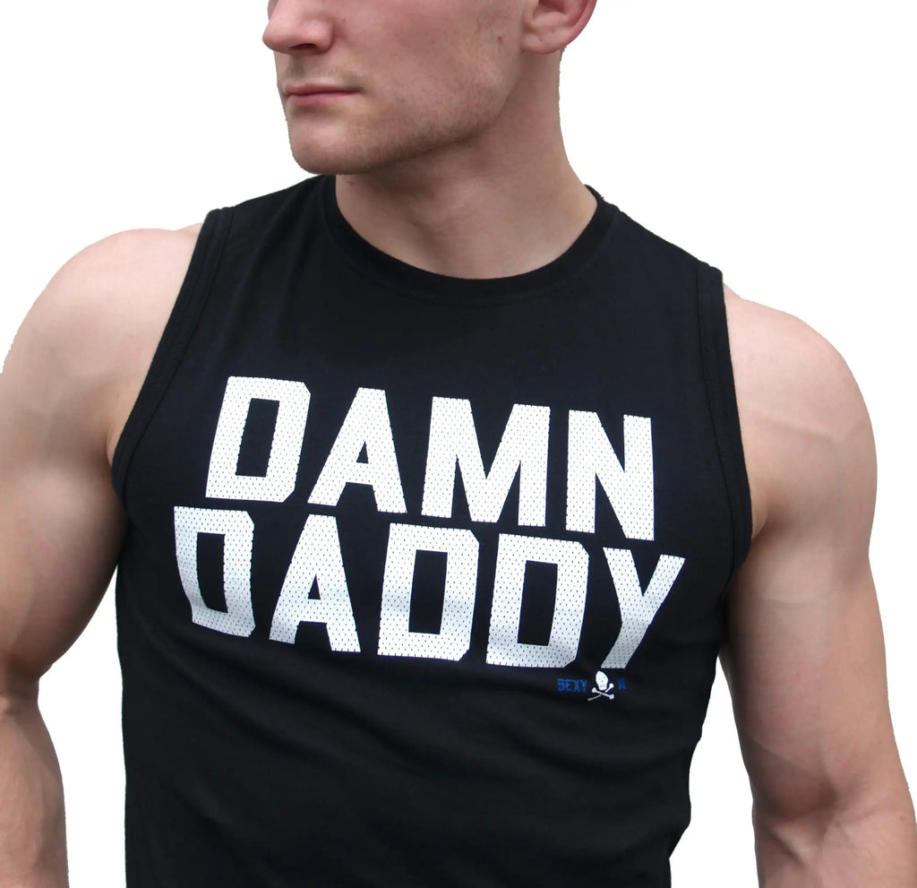 Black sleeveless athletic fit tank top with bold white damn daddy lettering and small blue logo beneath the text