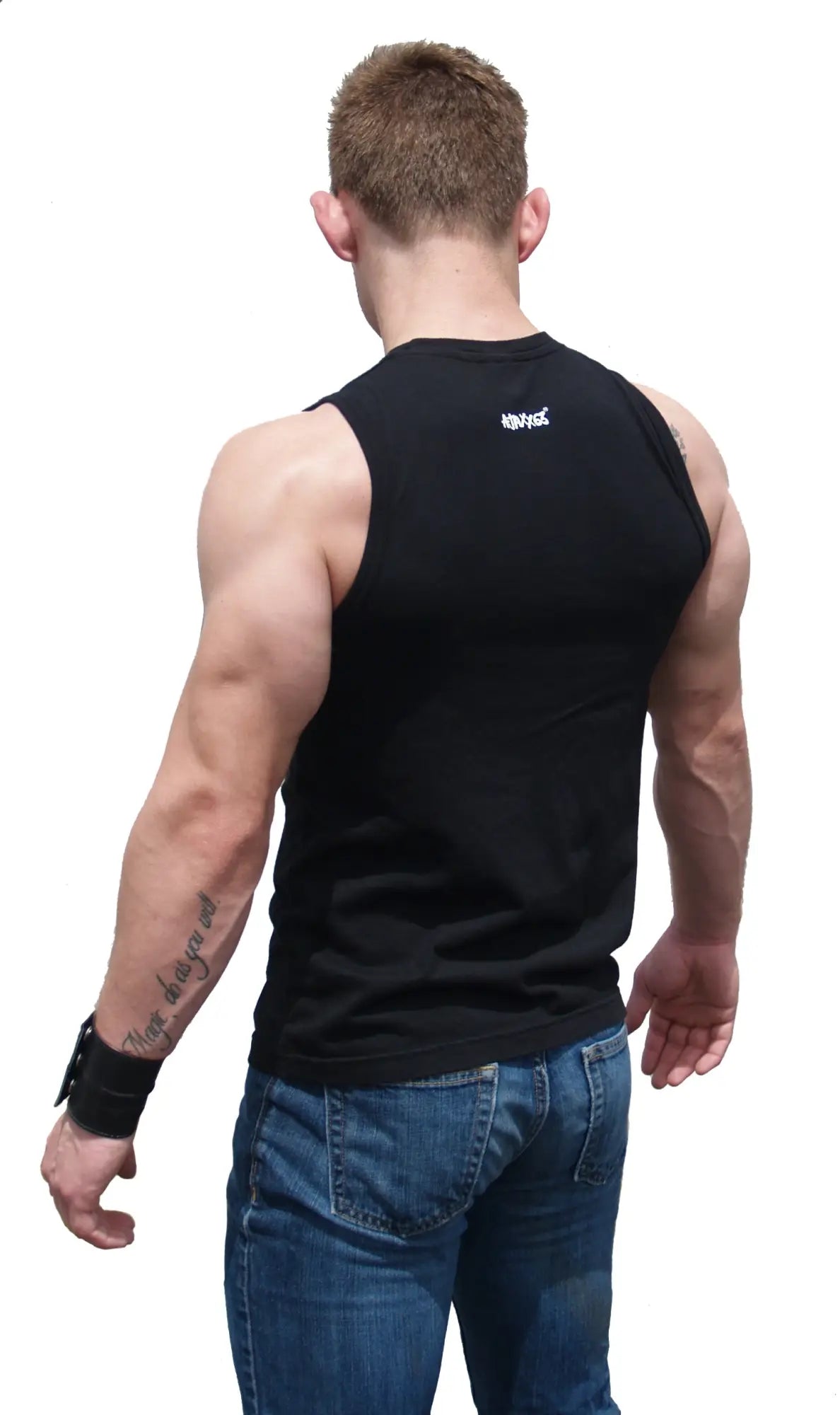 Back view of damn daddy sleeveless athletic fit black tank top with white logo on upper back for workout use