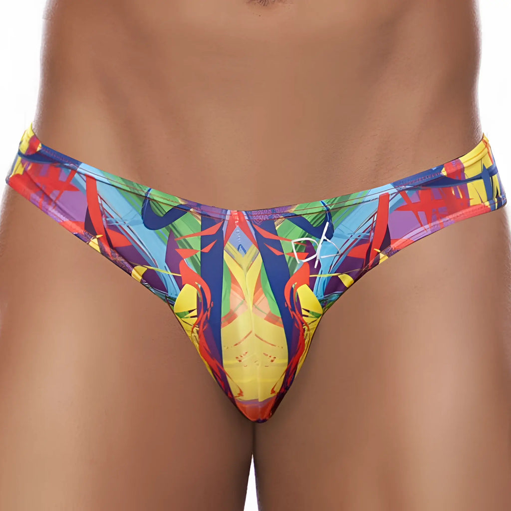 Daniel Alexander DA645 bikini brief vibrant abstract patterned men’s thong in glossy fabric with bold reds blues yellows and purples