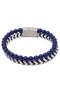 A daper fad bracelet featuring a navy blue beaded design with a black and white chevron woven band and silver clasp