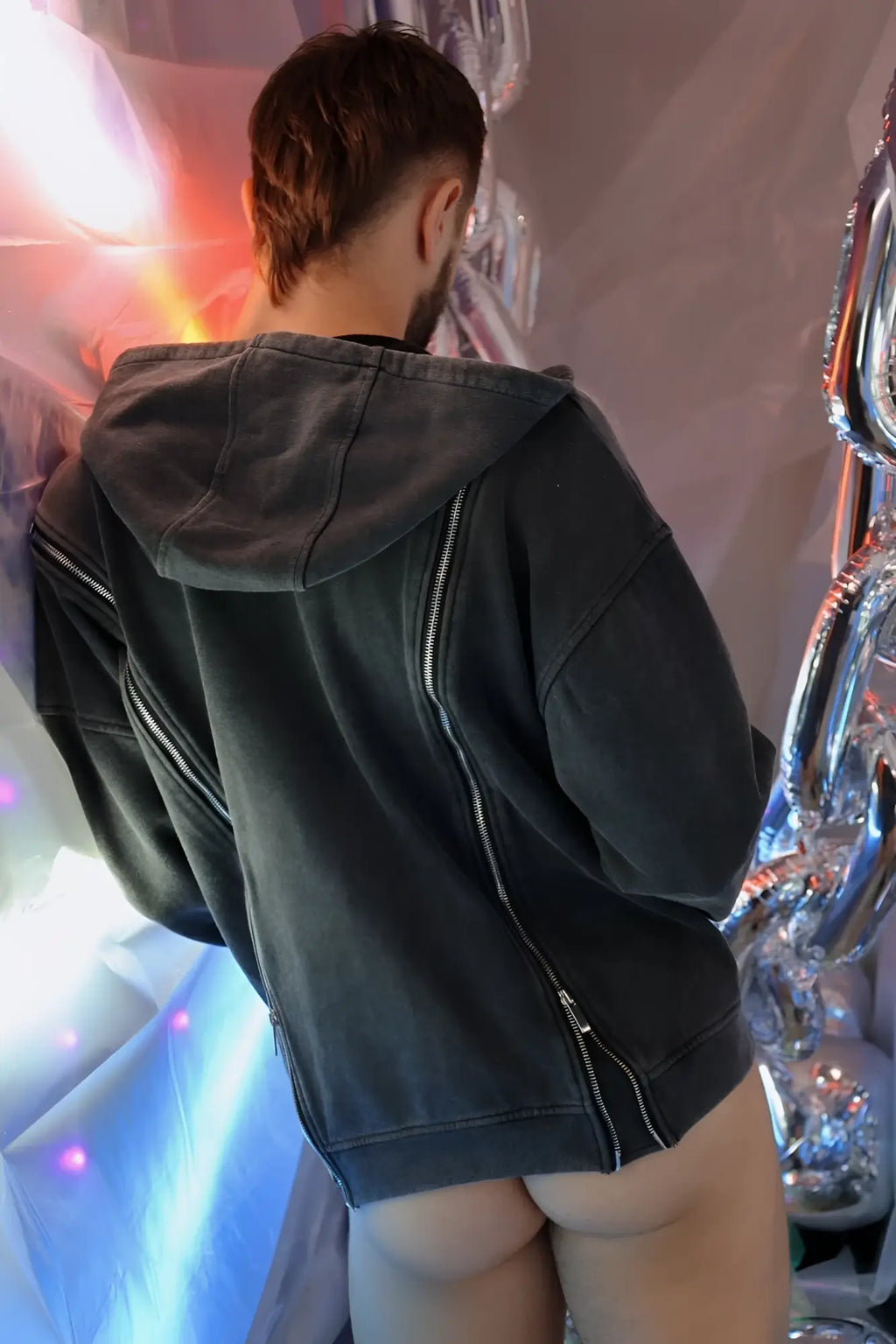 Black denim darkroom hoodie with silver zippers and relaxed fit for casual wear