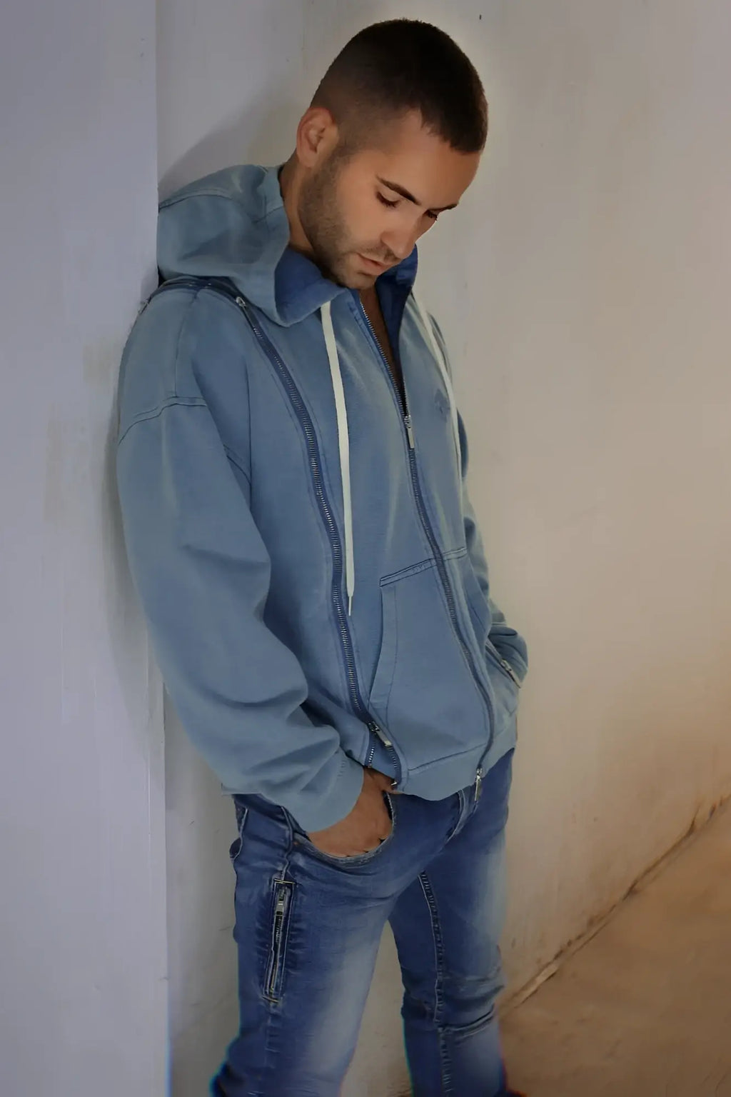 Darkroom hoodie light blue denim with white zipper pulls and front pockets for casual wear
