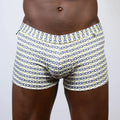 White boxer briefs with a repeating navy blue and yellow horseshoe designer buckle print square cut trunk