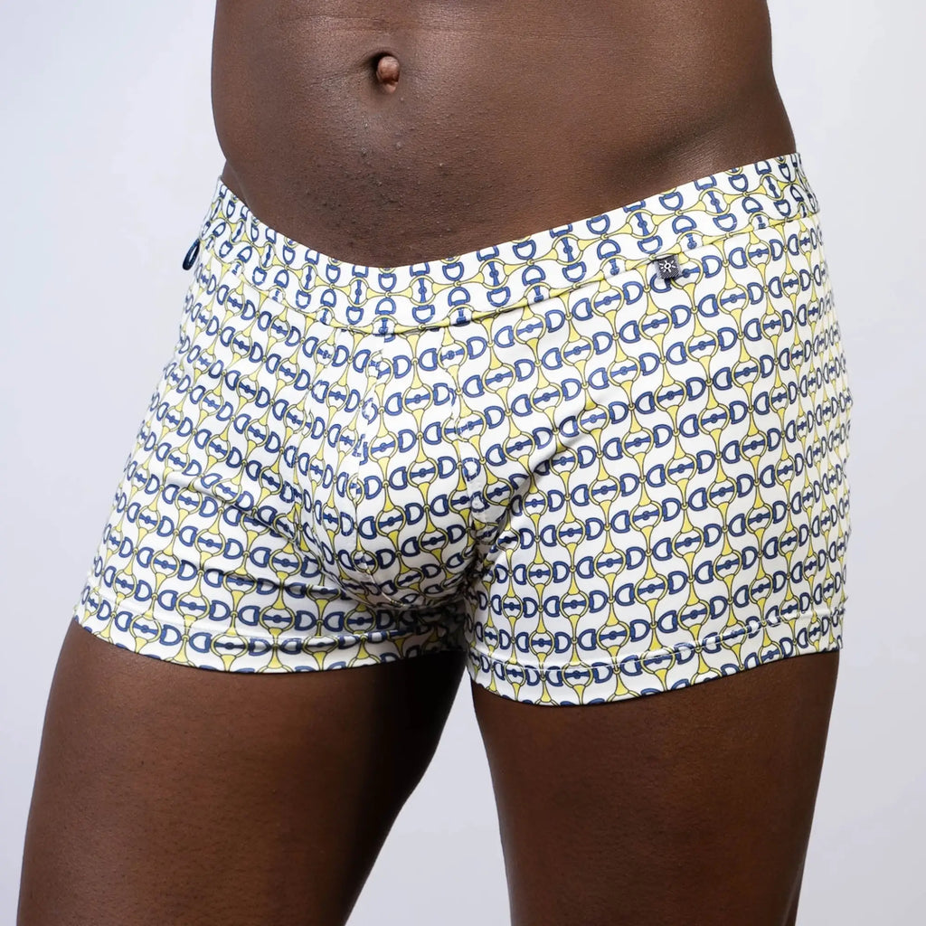 White designer buckle print sq cut trunk boxer briefs with navy blue and yellow interlocking d-shaped links pattern