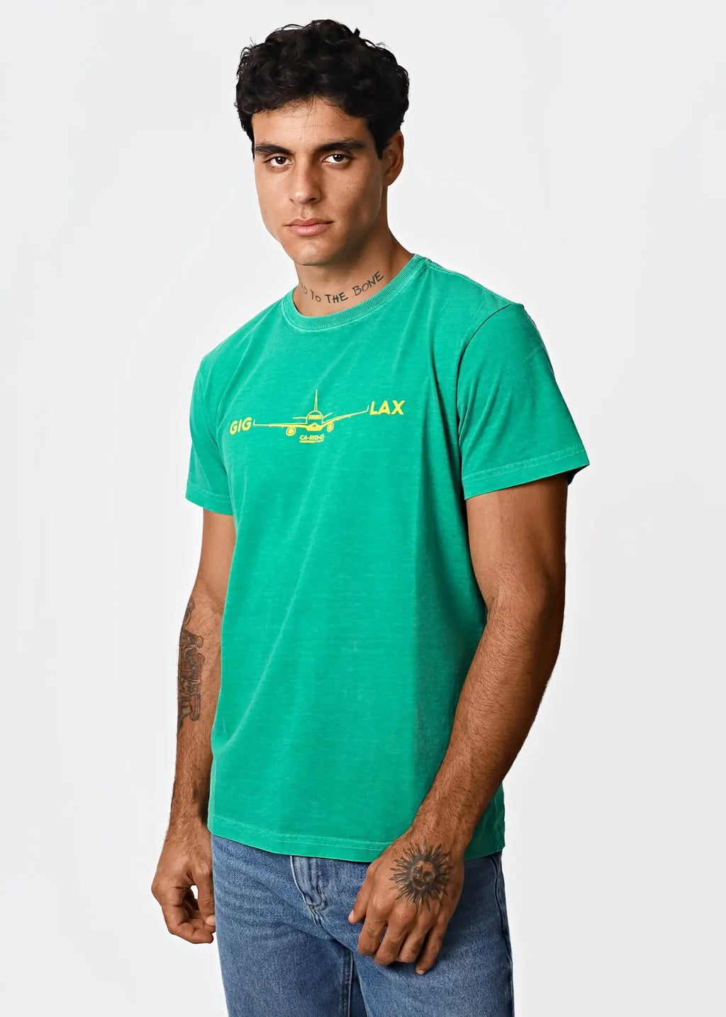 A vibrant green cotton men’s t-shirt with a yellow airplane graphic and gig lax text for destination lax fans