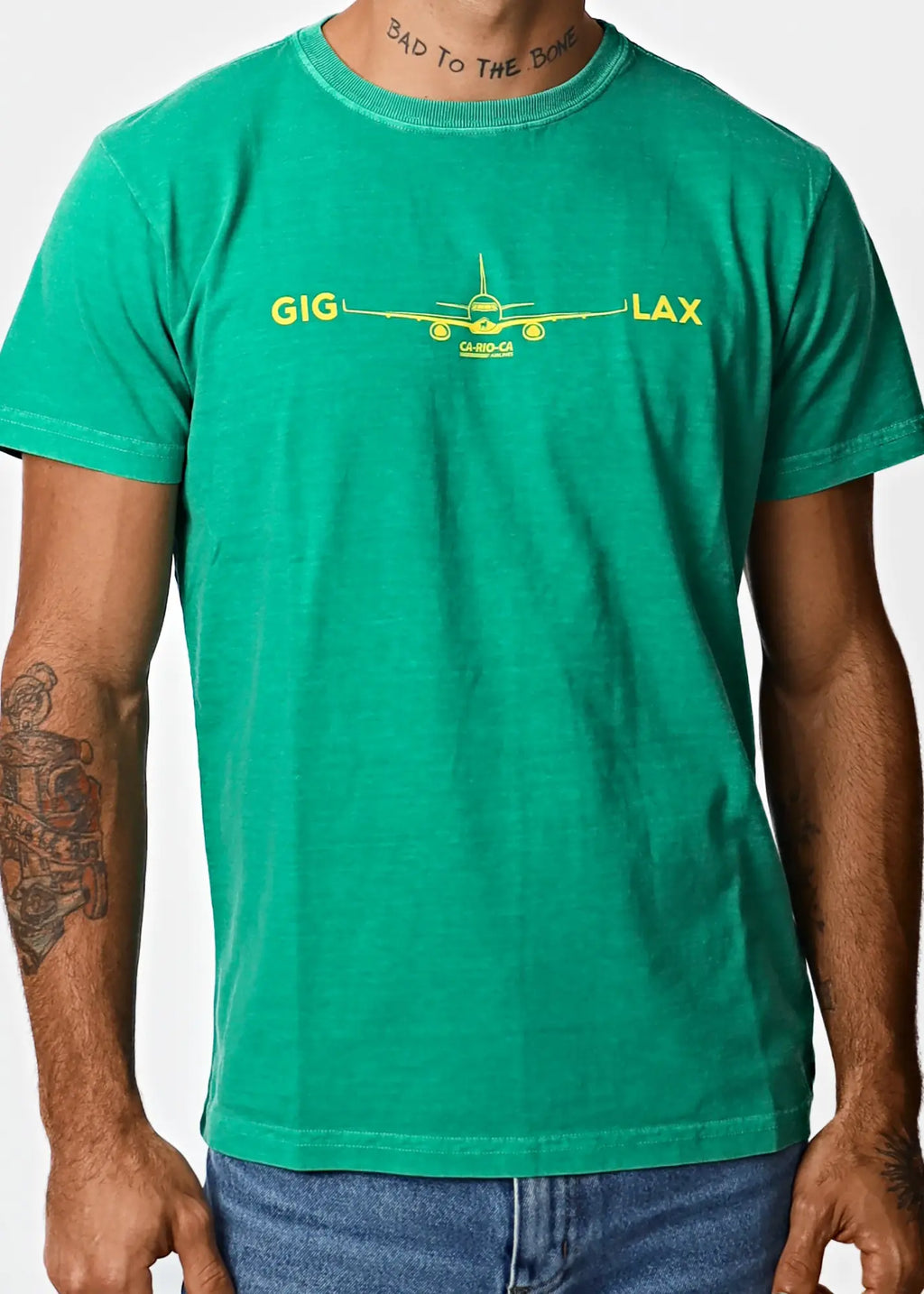 Vibrant teal cotton men’s t-shirt featuring a yellow airplane graphic with gig and lax prints destination lax la design