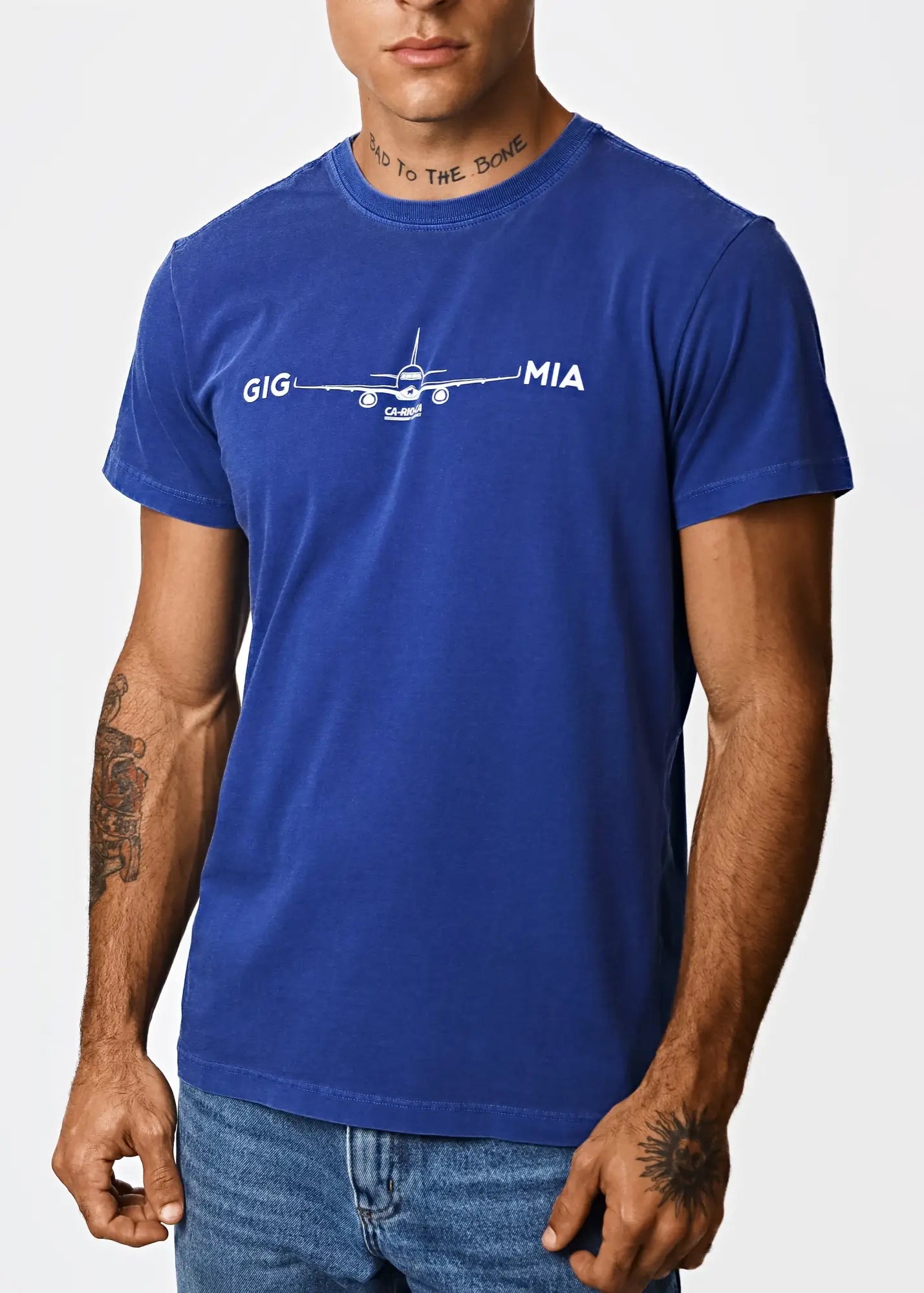 Royal blue cotton men’s t-shirt with white airplane graphic and gig and mia text for destination Miami style