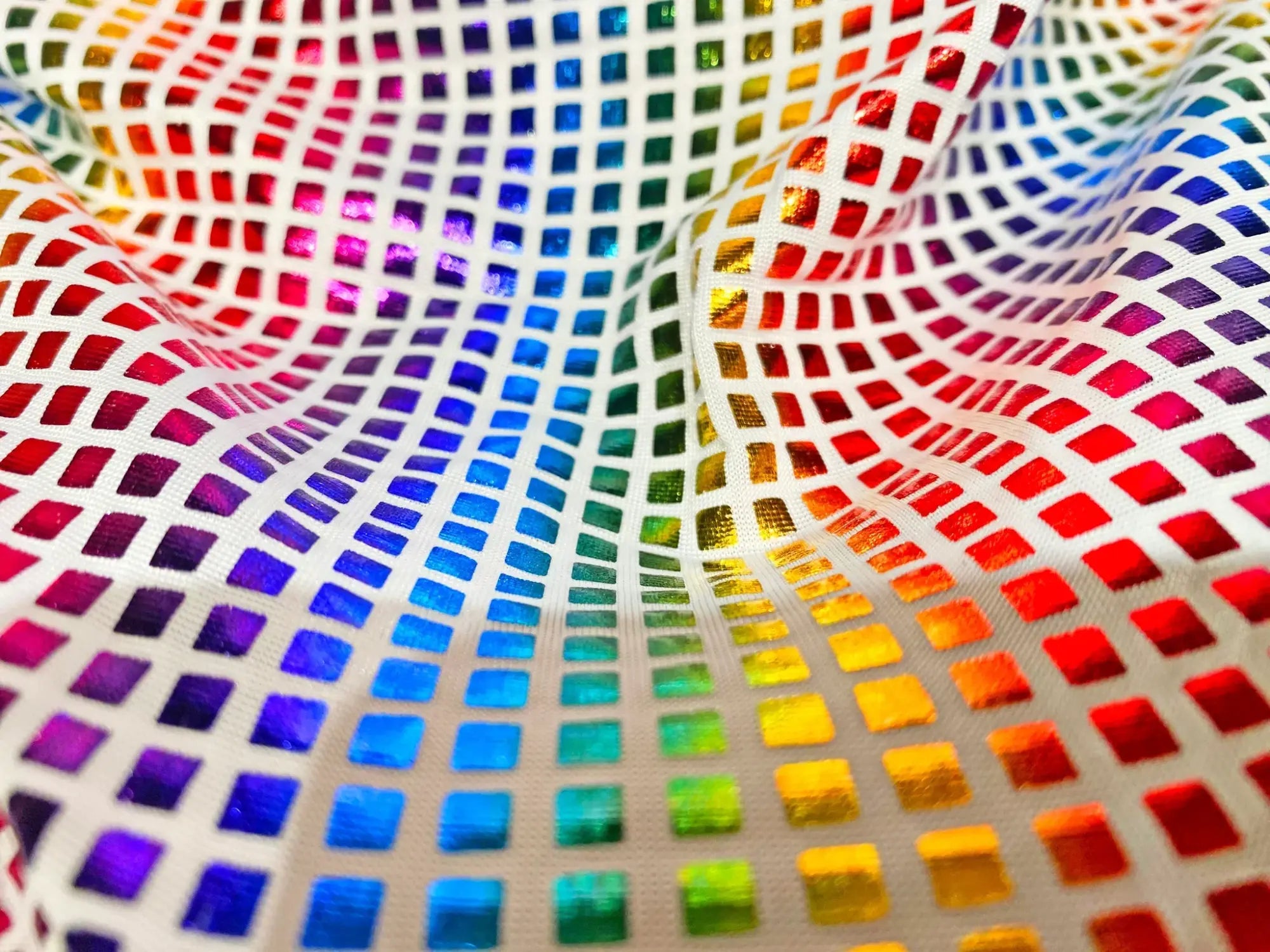 Disco queen tank with rainbow-colored mesh fabric and iridescent square tile grid for a vibrant party look