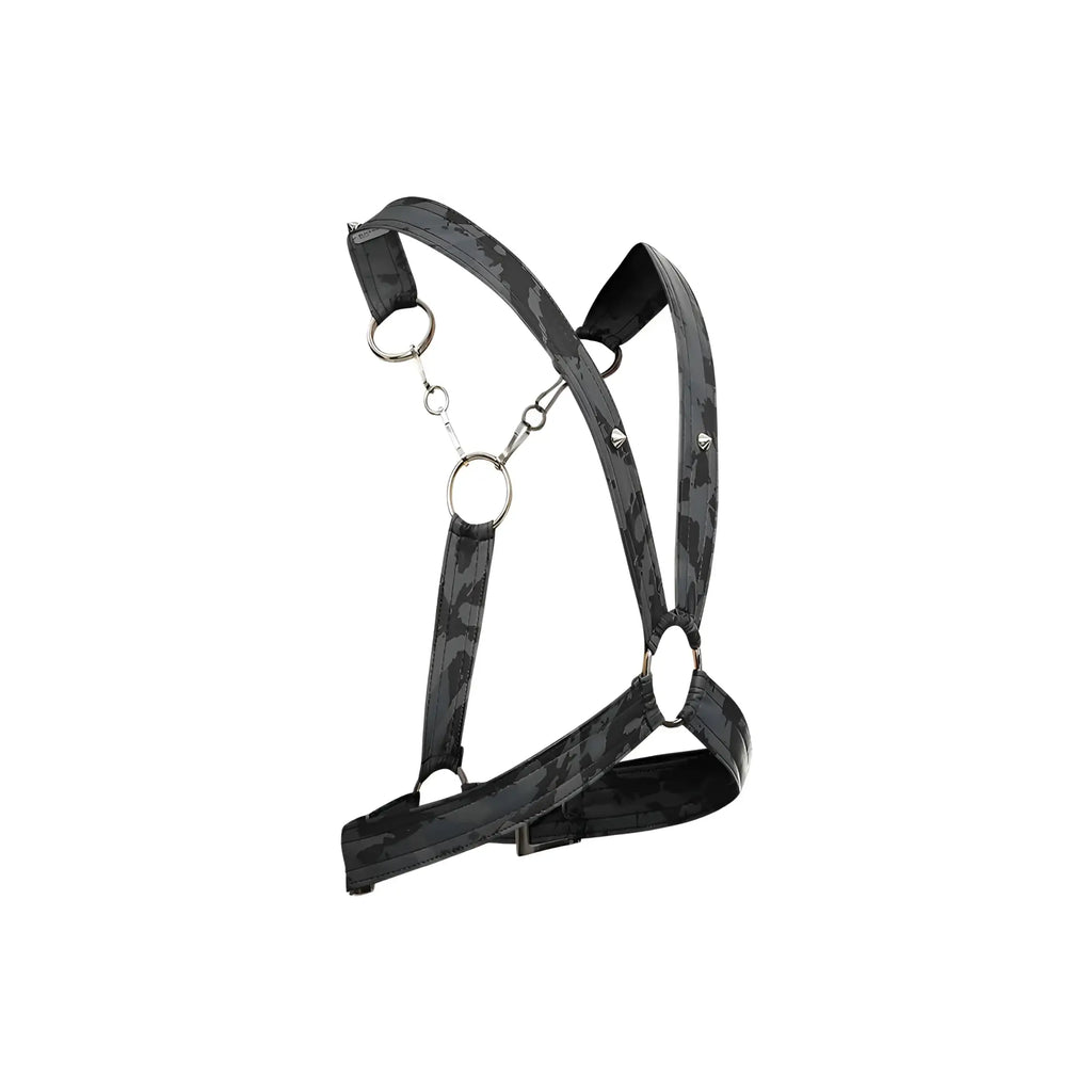 Black camouflage DNGEON cross chain harness with metallic rings and adjustable straps shown from the back side