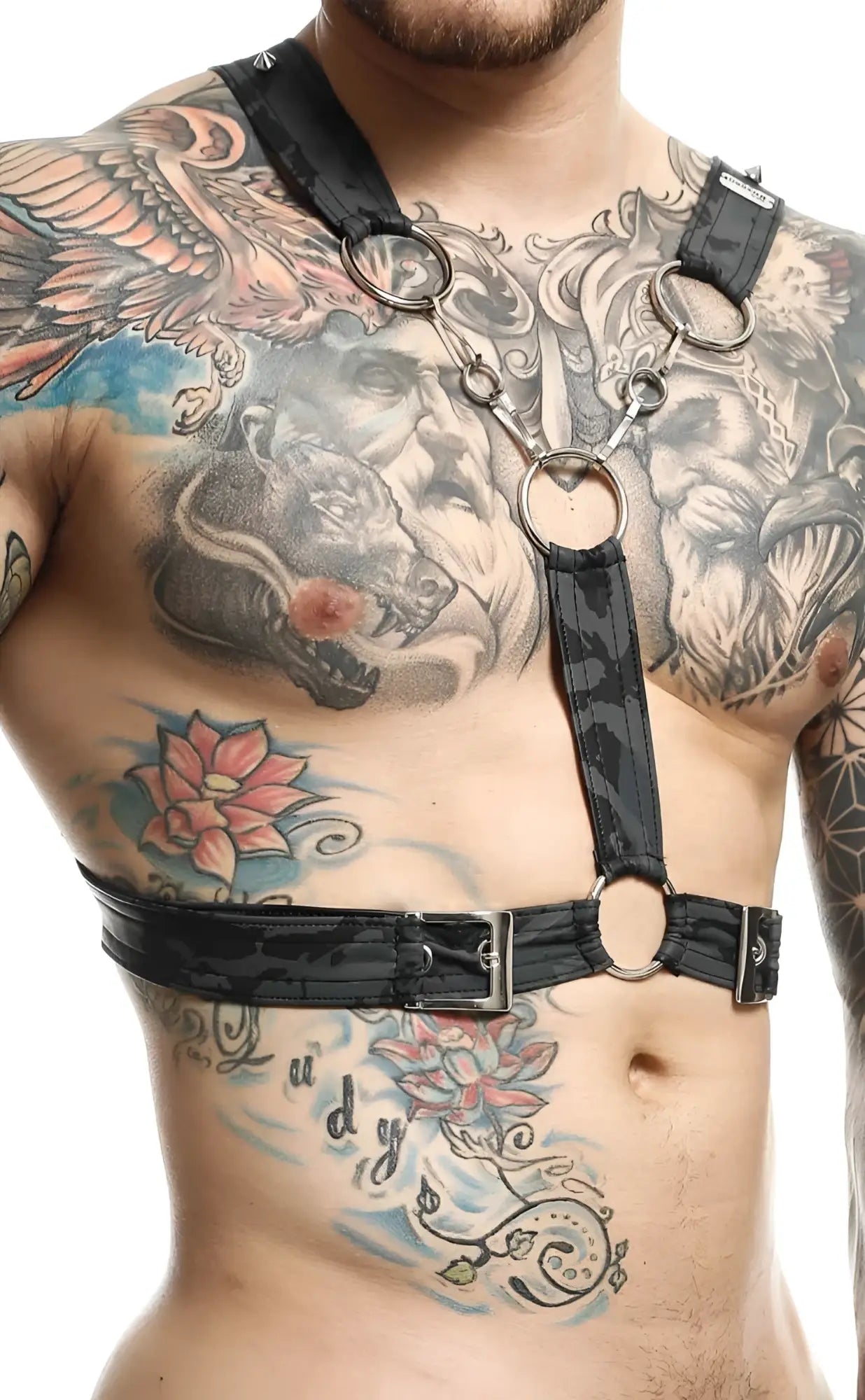 Black leather dngeon cross chain harness with silver metal rings and buckles showcasing its front design