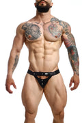 Black leather thong jockstrap with silver studs and small brand logo on waistband from dngeon peekaboo animal line
