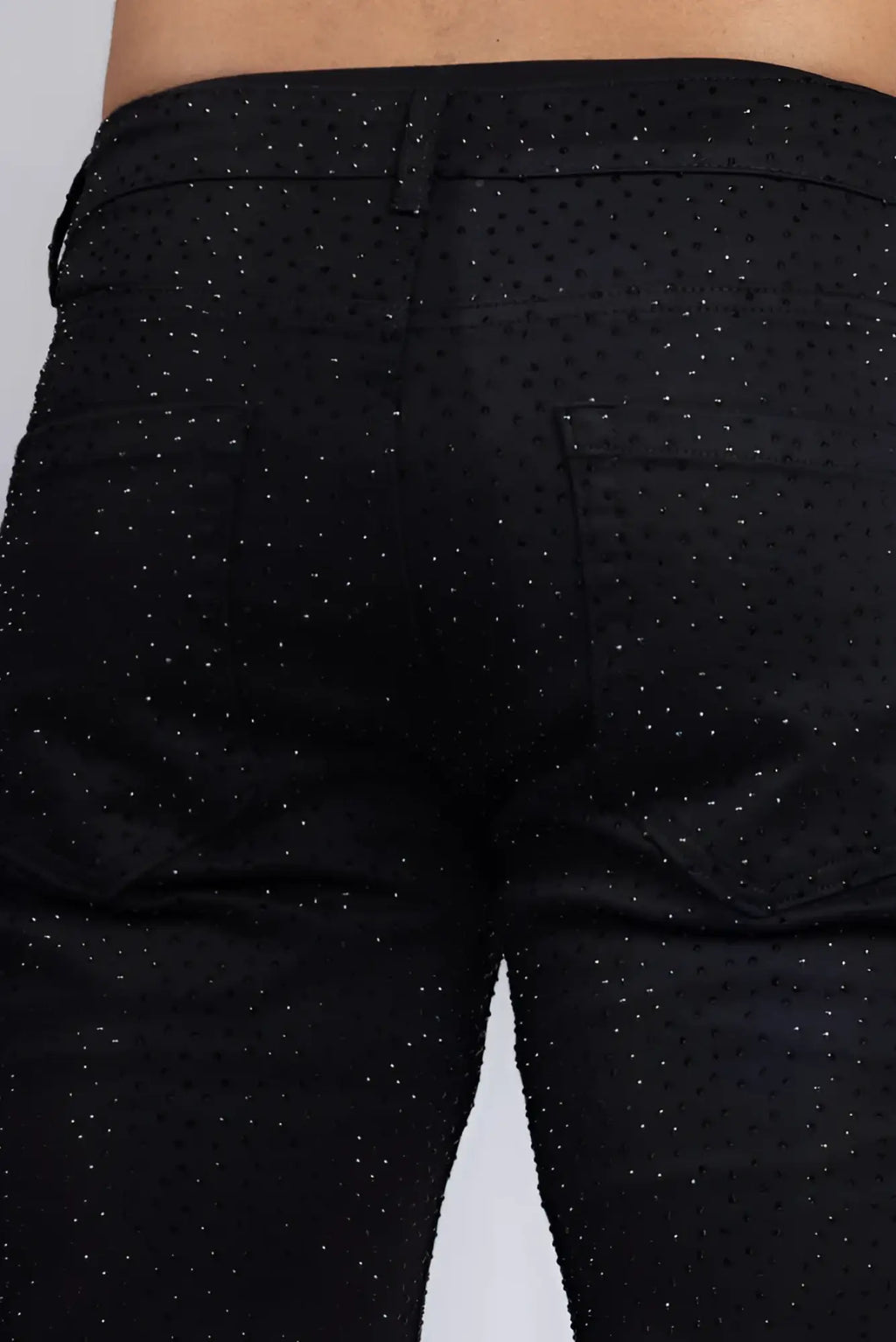 Dolorosa rhinestone jeans in black denim with a subtle glittery dot pattern across the fabric