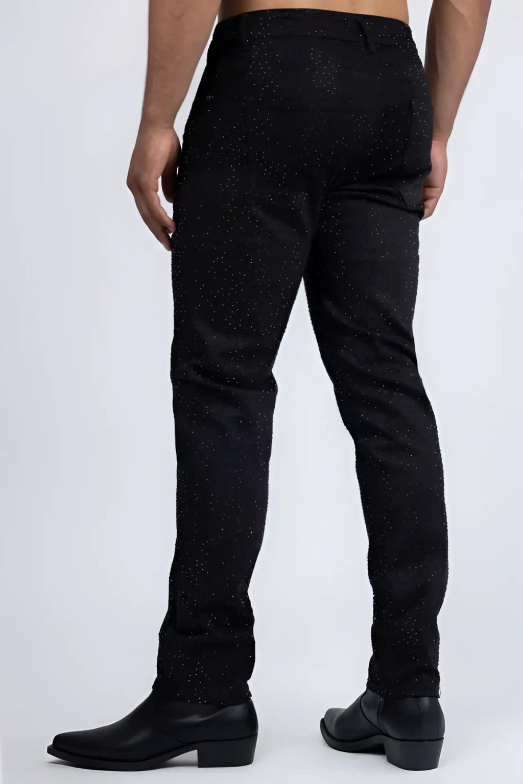 Black dolorosa rhinestone jeans with subtle glittery speckle pattern on denim fabric for stylish casual wear