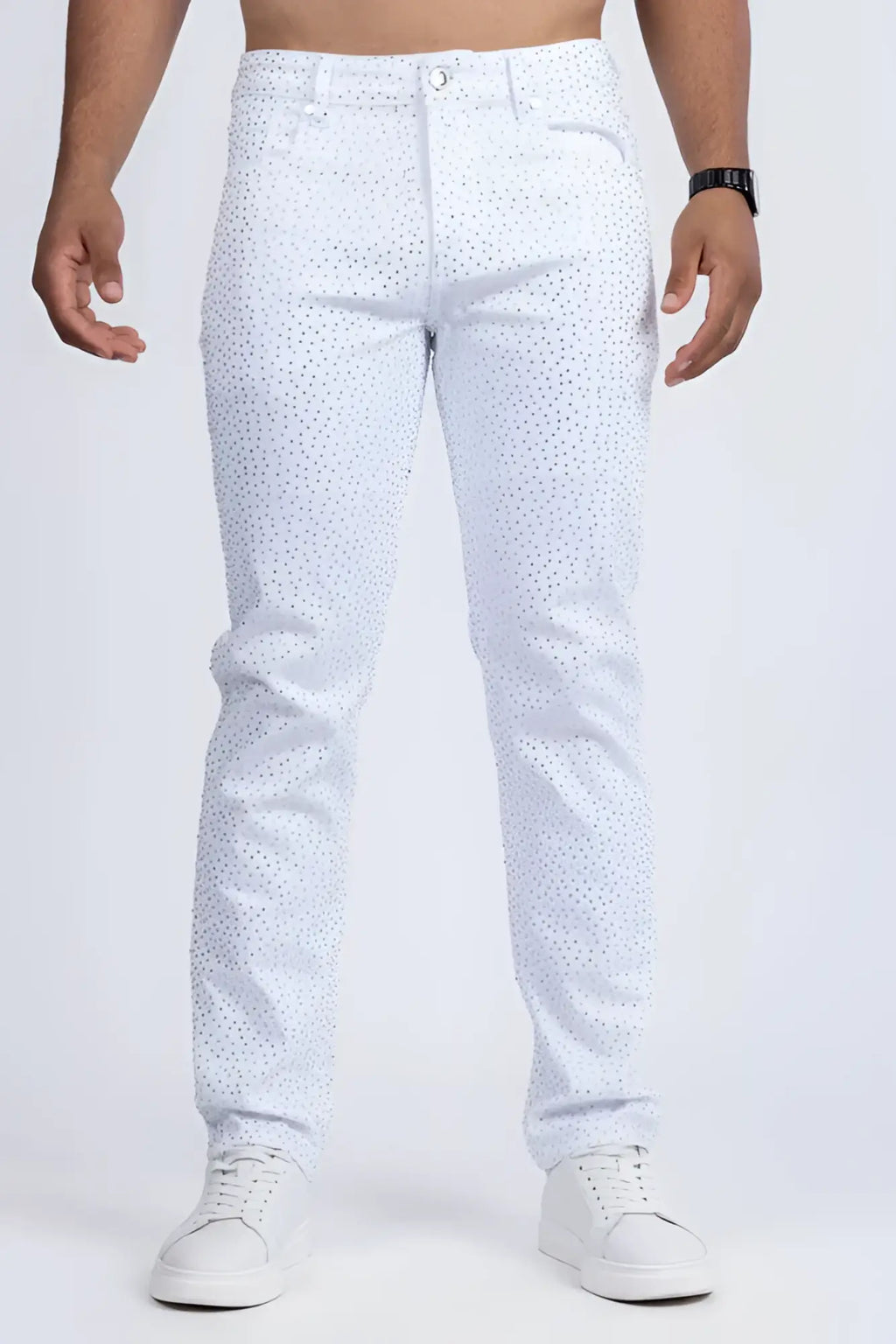 White denim dolorosa rhinestone jeans with subtle perforated pattern across the fabric